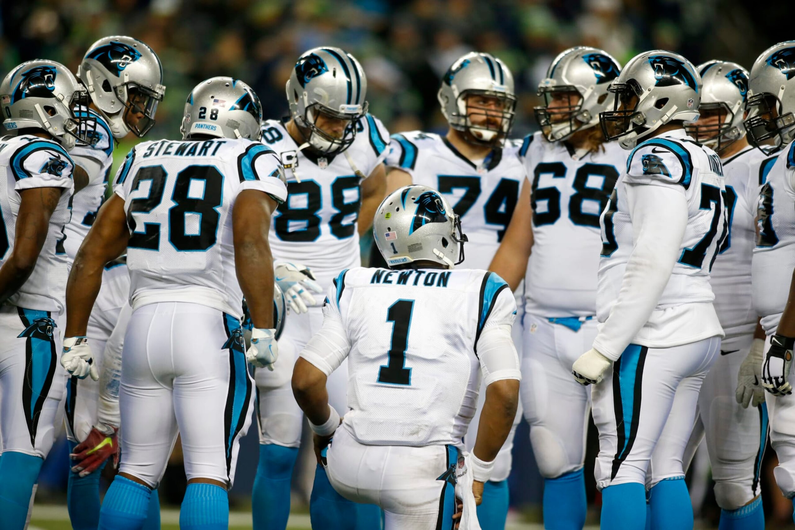 SEATTLE, WA - DECEMBER 04: Quarterback Cam Newton #1 of the Carolina Panthers leads a huddle against the Seattle Seahawks at CenturyLink Field on December 4, 2016 in Seattle, Washington. (Photo by Jonathan Ferrey/Getty Images)