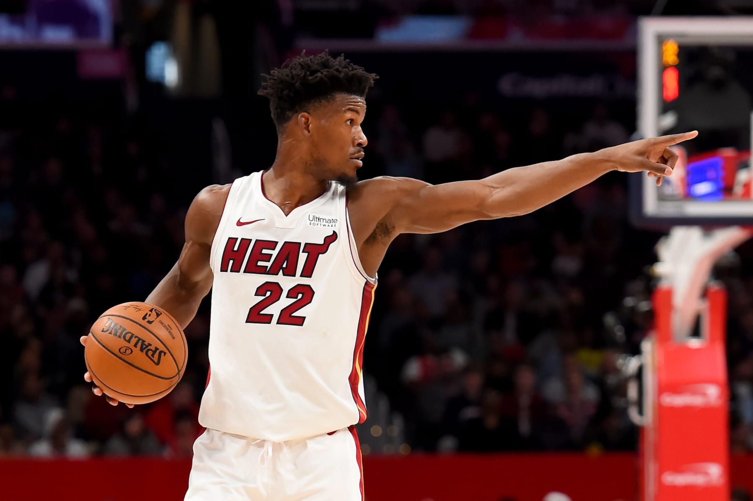 WASHINGTON, DC - DECEMBER 30: Jimmy Butler #22 of the Miami Heat dribbles against the Washington Wizards during the first half at Capital One Arena on December 30, 2019 in Washington, DC. NOTE TO USER: User expressly acknowledges and agrees that, by downloading and or using this photograph, User is consenting to the terms and conditions of the Getty Images License Agreement. (Photo by Will Newton/Getty Images)