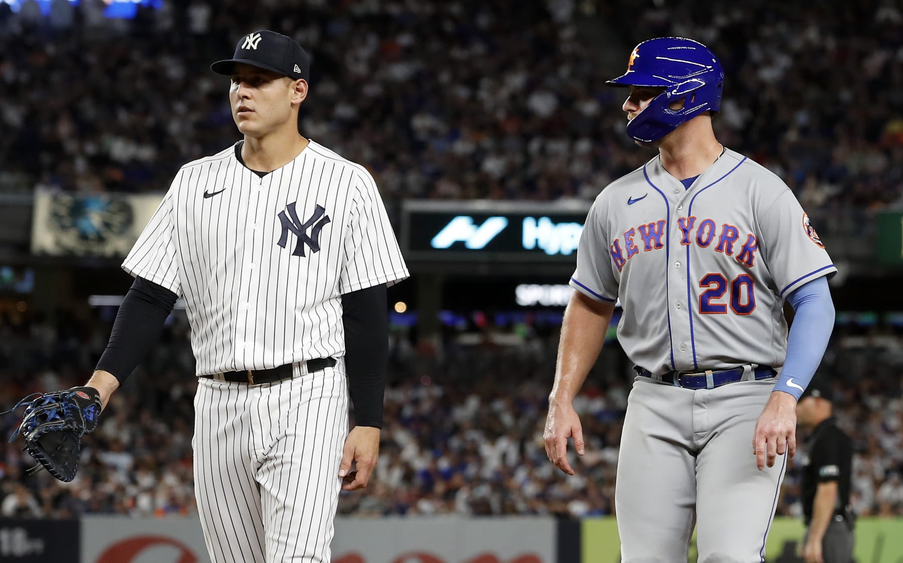 NEW YORK, NEW YORK - AUGUST 23:  Pete Alonso #20 of the New York Mets in action against Anthony Rizzo #48 of the New York Yankees at Yankee Stadium on August 23, 2022 in New York City. The Yankees defeated the Mets 4-2. (Photo by Jim McIsaac/Getty Images)