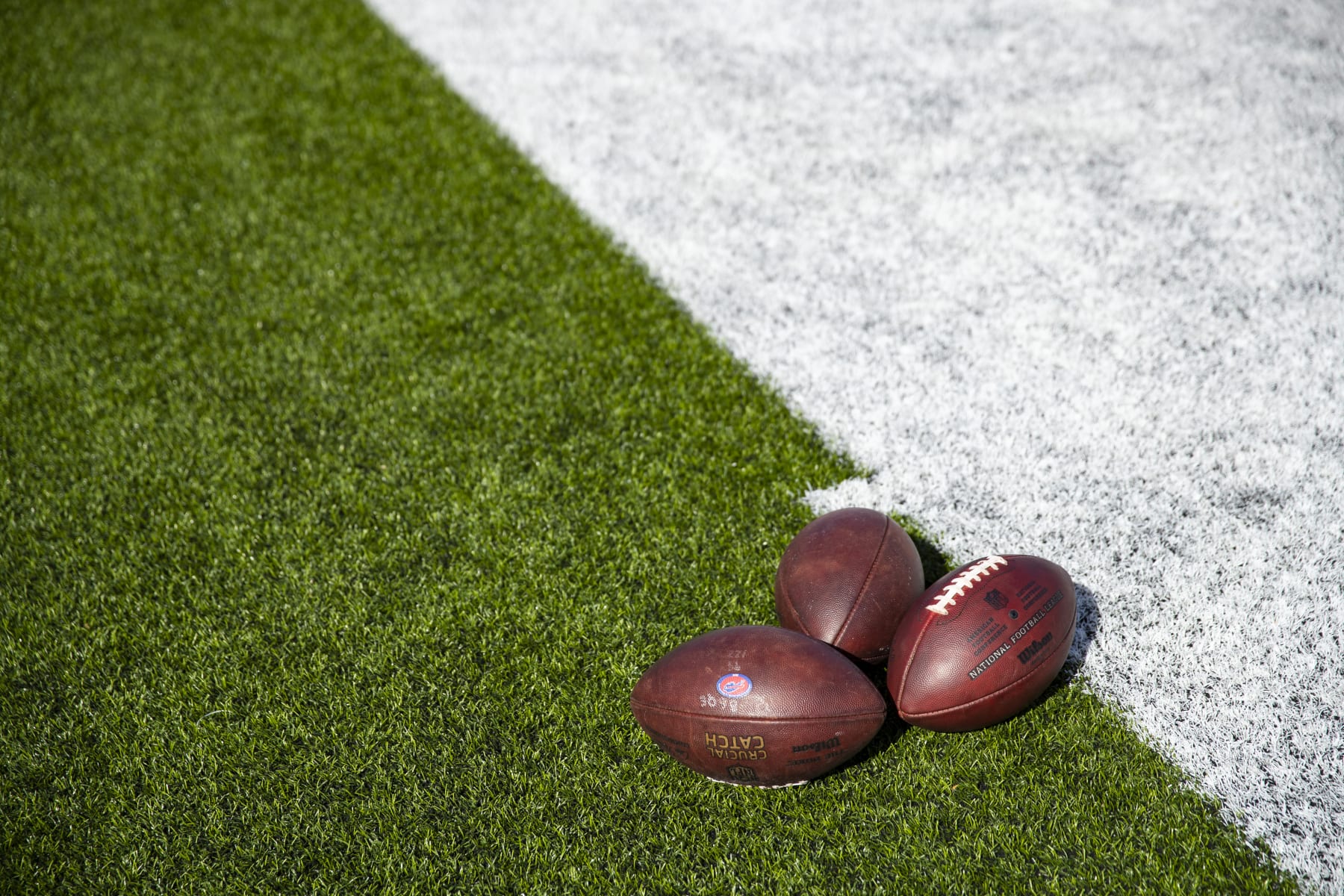 ORCHARD PARK, NY - OCTOBER 20:  Detail view of NFL footballs on the sideline before the game between the Buffalo Bills and the Miami Dolphins at New Era Field on October 20, 2019 in Orchard Park, New York. Buffalo defeats Miami 31-21.  (Photo by Brett Carlsen/Getty Images)