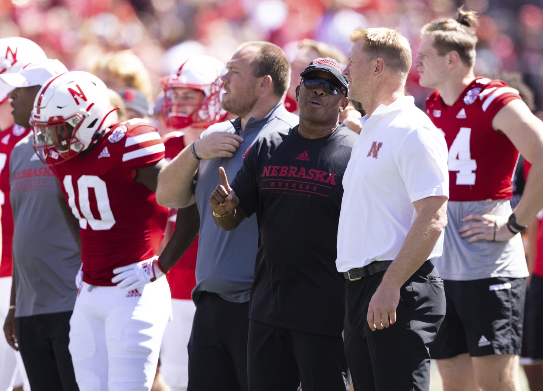 Nebraska associate head coach and wide receivers/passing game coordinator Mickey Joseph, left, chats with head coach Scott Frost before the team plays against North Dakota in an NCAA college football game Saturday, Sept. 3, 2022, in Lincoln, Neb. (AP Photo/Rebecca S. Gratz) Nebraska associate head coach and wide receivers/passing game coordinator Mickey Joseph, left, chats with head coach Scott Frost before the team plays against North Dakota in an NCAA college football game Saturday, Sept. 3, 2022, in Lincoln, Neb. (AP Photo/Rebecca S. Gratz)