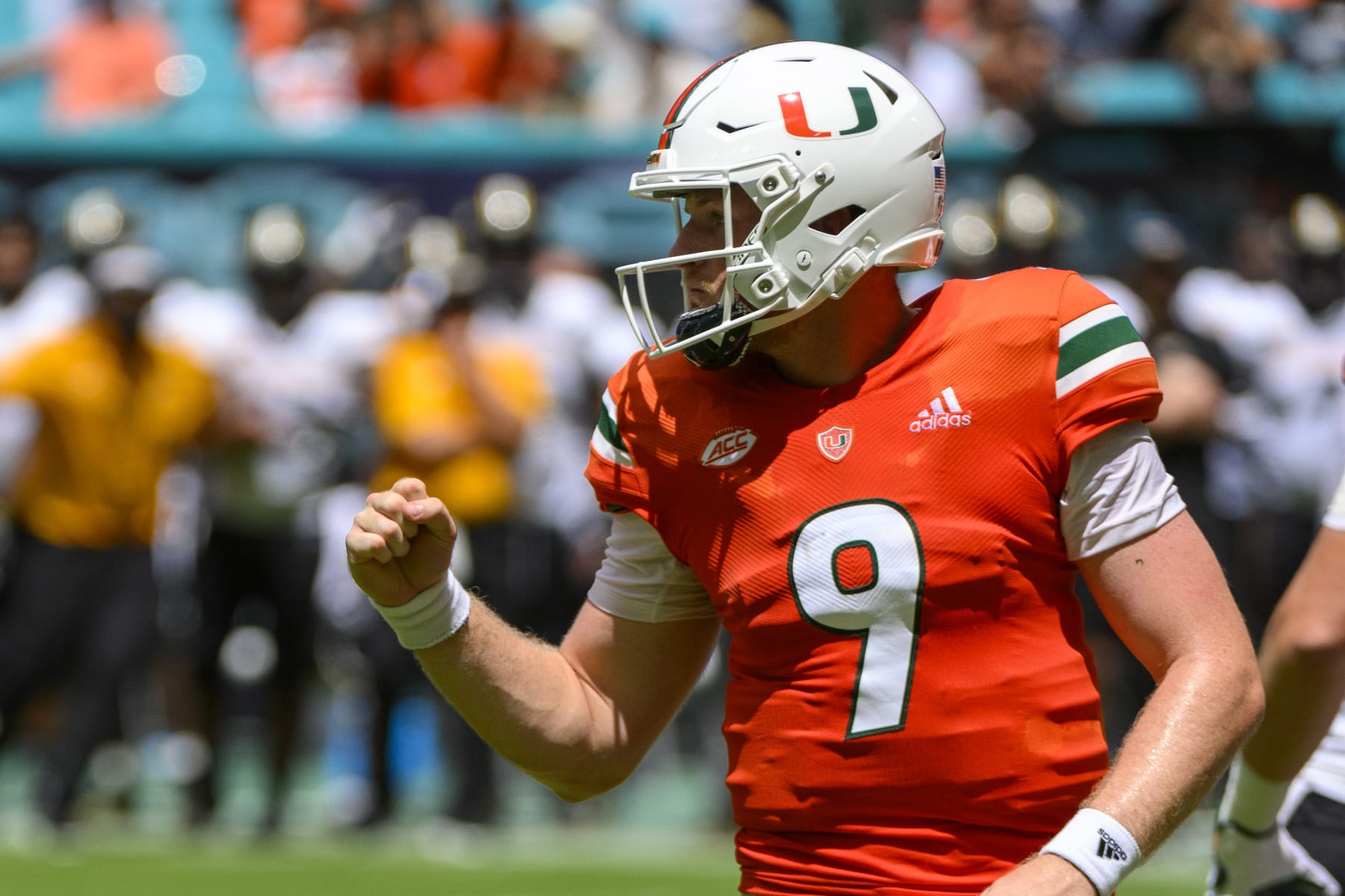 MIAMI GARDENS, FL - SEPTEMBER 10: Miami quarterback Tyler Van Dyke (9) pumps his fist as he celebrates Miami running back Henry Parrish, Jr. (not shown) scoring a touchdown during the college football game between the Southern Miss Golden Eagles and the University of Miami Hurricanes on September 10, 2022 at the Hard Rock Stadium in Miami Gardens, FL. (Photo by Doug Murray/Icon Sportswire via Getty Images) MIAMI GARDENS, FL - SEPTEMBER 10: Miami quarterback Tyler Van Dyke (9) pumps his fist as he celebrates Miami running back Henry Parrish, Jr. (not shown) scoring a touchdown during the college football game between the Southern Miss Golden Eagles and the University of Miami Hurricanes on September 10, 2022 at the Hard Rock Stadium in Miami Gardens, FL. (Photo by Doug Murray/Icon Sportswire via Getty Images)