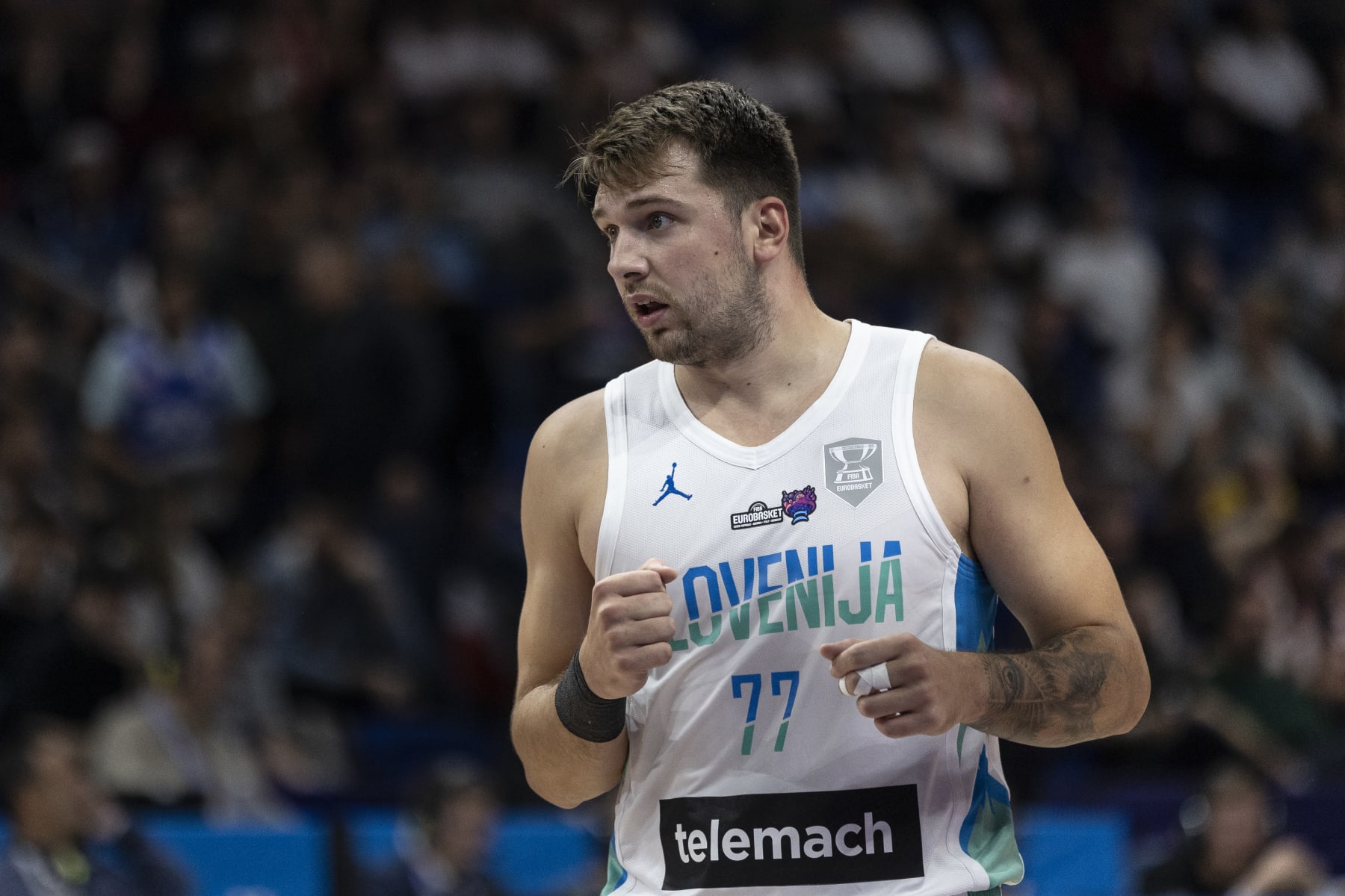 BERLIN, GERMANY - SEPTEMBER 14: Luka Doncic looks on during the FIBA EuroBasket 2022 quarterfinal  match between Slovenia v Poland at EuroBasket Arena Berlin on September 14, 2022 in Berlin, Germany. (Photo by Maja Hitij/Getty Images)
