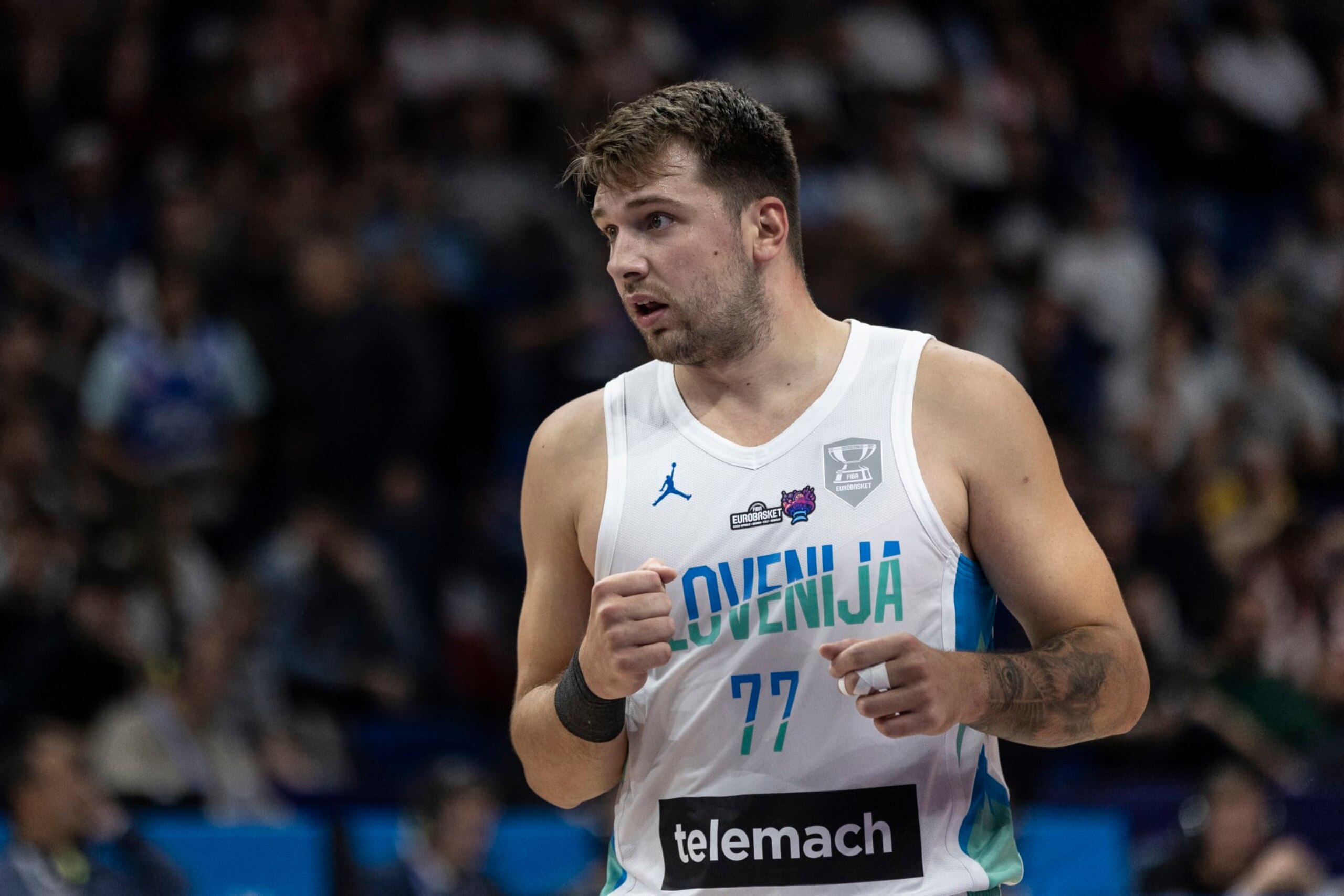 BERLIN, GERMANY - SEPTEMBER 14: Luka Doncic looks on during the FIBA EuroBasket 2022 quarterfinal  match between Slovenia v Poland at EuroBasket Arena Berlin on September 14, 2022 in Berlin, Germany. (Photo by Maja Hitij/Getty Images)