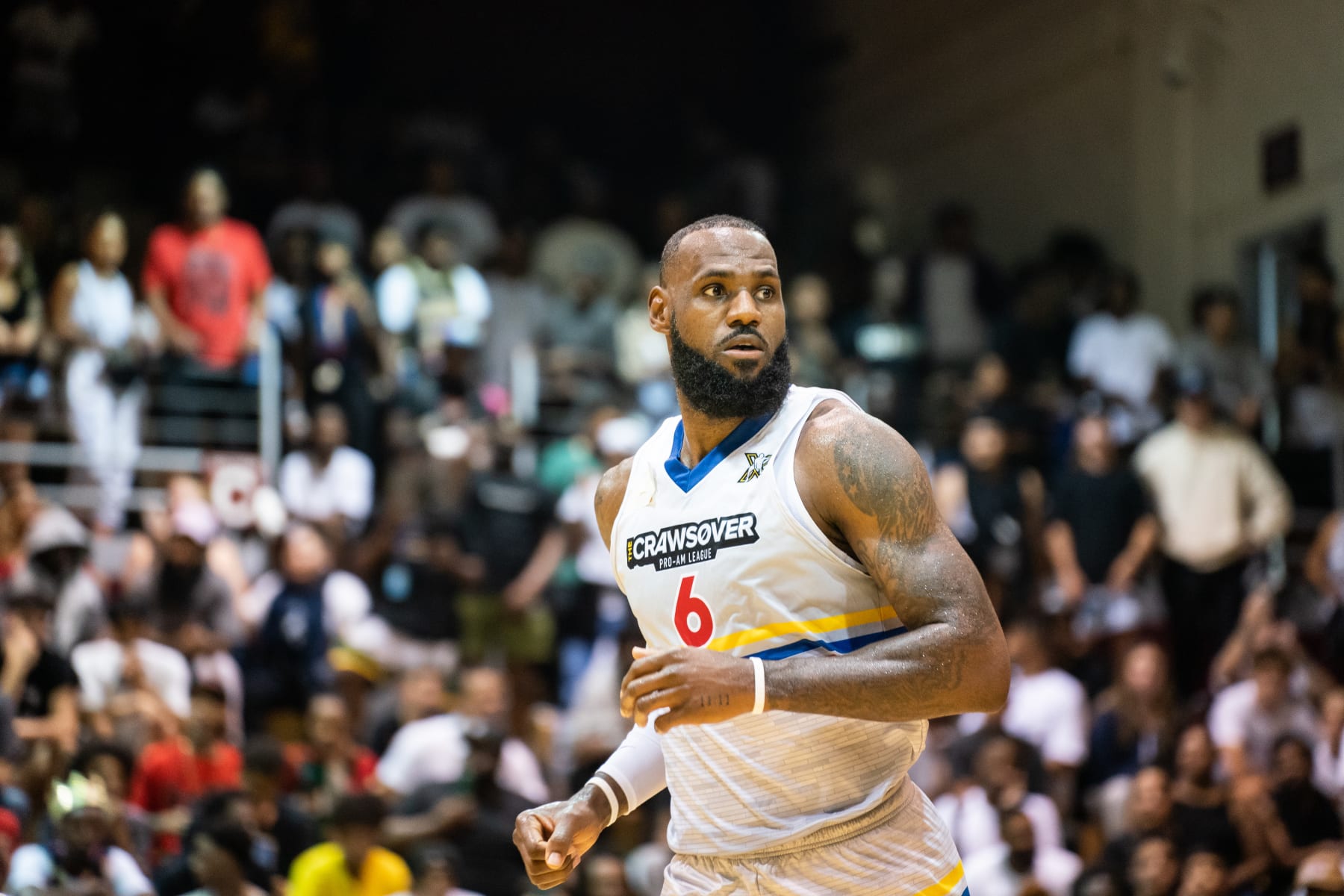 SEATTLE, WASHINGTON - AUGUST 20: LeBron James runs down the court during the CrawsOver Pro-Am game at Seattle Pacific University on August 20, 2022 in Seattle, Washington. (Photo by Cassy Athena/Getty Images)