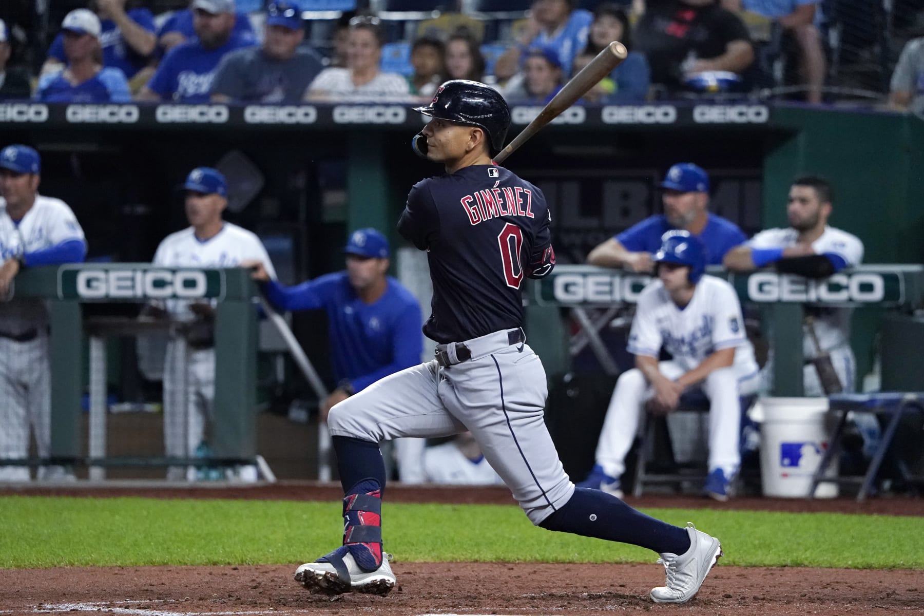 KANSAS CITY, MISSOURI - SEPTEMBER 05:  Andres Gimenez #0 of the Cleveland Guardians hits against the Kansas City Royals at Kauffman Stadium on September 05, 2022 in Kansas City, Missouri. (Photo by Ed Zurga/Getty Images)