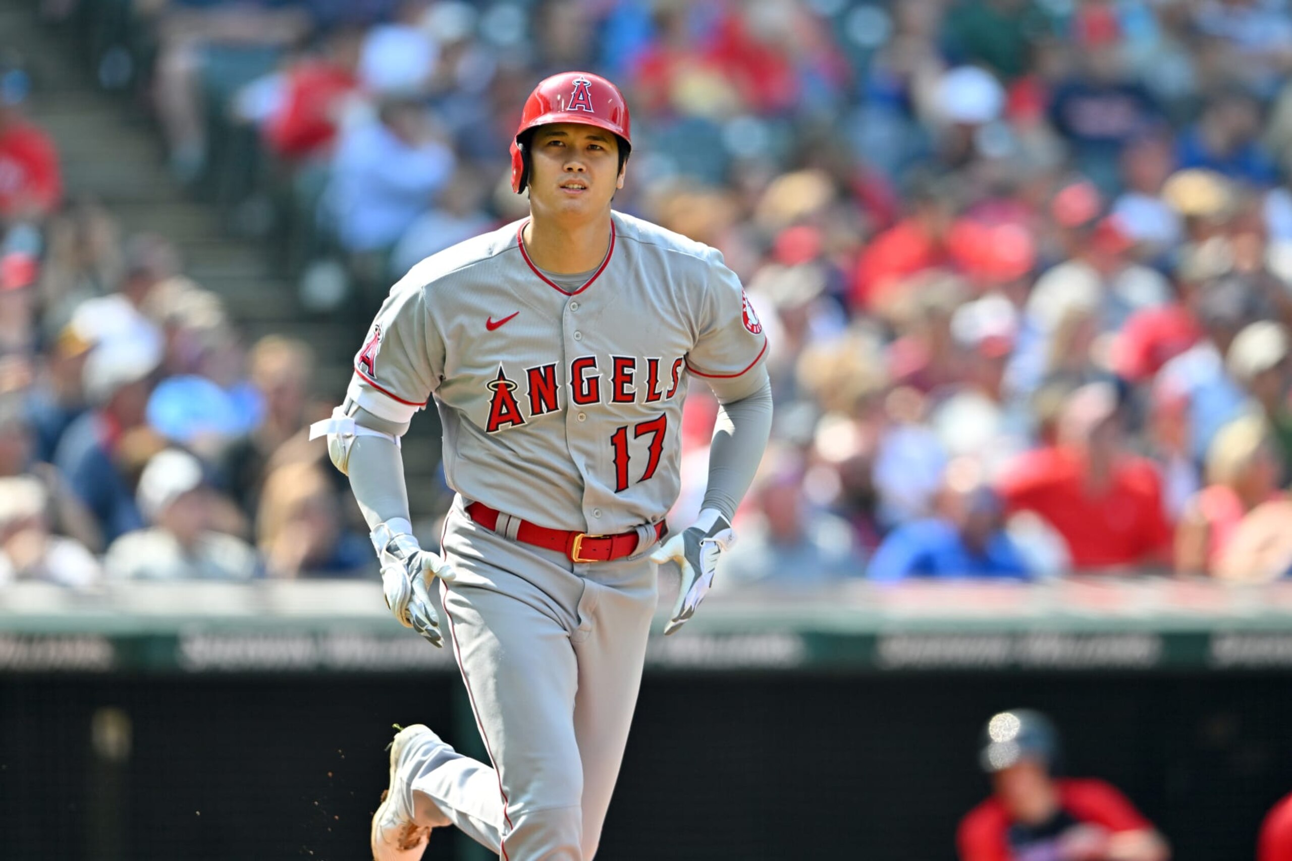 CLEVELAND, OHIO - SEPTEMBER 14: Shohei Ohtani #17 of the Los Angeles Angels runs out a fly ball during the third inning against the Cleveland Guardians at Progressive Field on September 14, 2022 in Cleveland, Ohio. (Photo by Jason Miller/Getty Images)