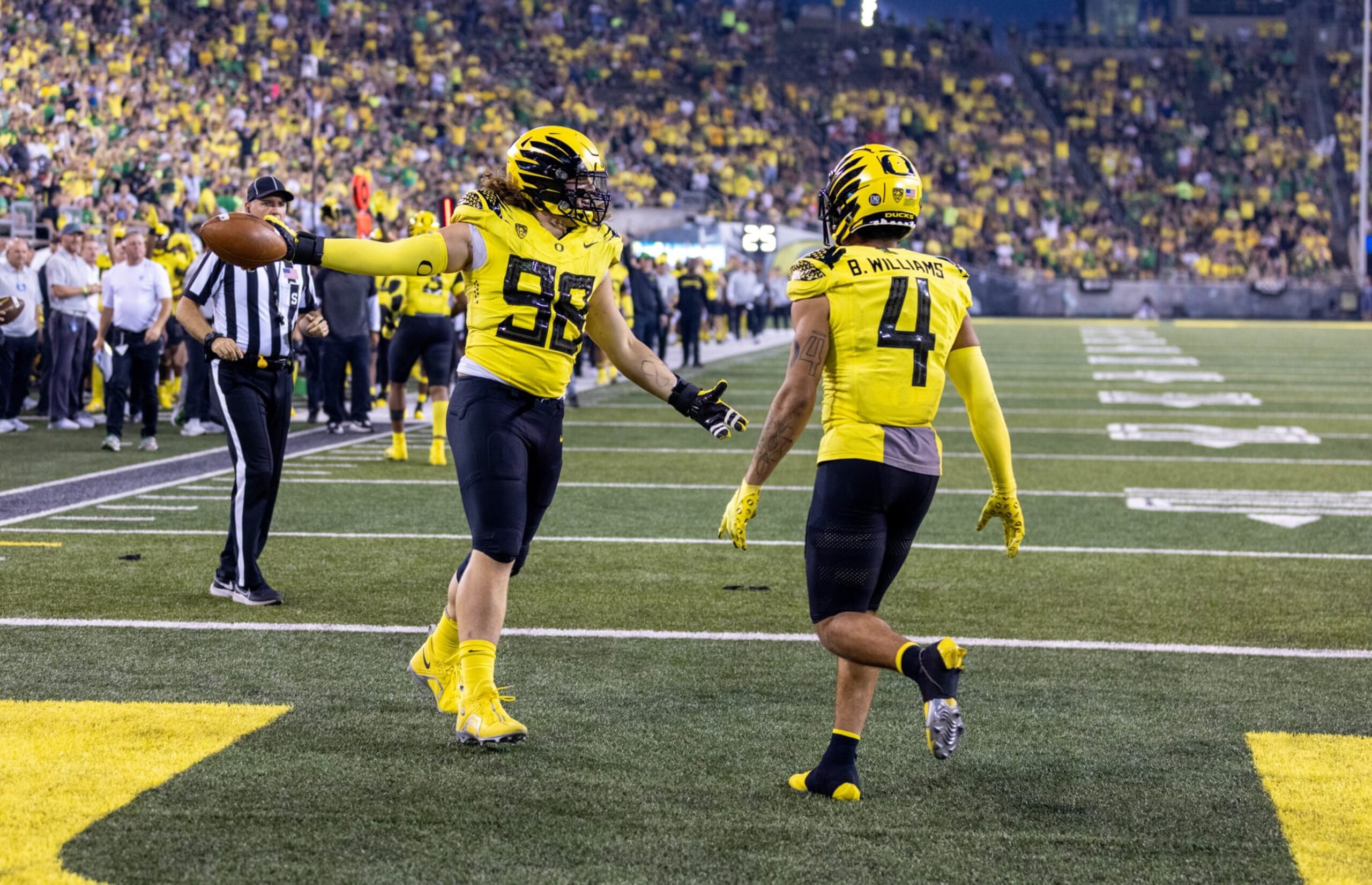 EUGENE, OR - SEPTEMBER 10: Casey Rogers #98 of the Oregon Ducks celebrates a defensive touchdown during the second half of the game against the Eastern Washington Eagles at Autzen Stadium on September 10, 2022 in Eugene, Oregon. (Photo by Tom Hauck/Getty Images)