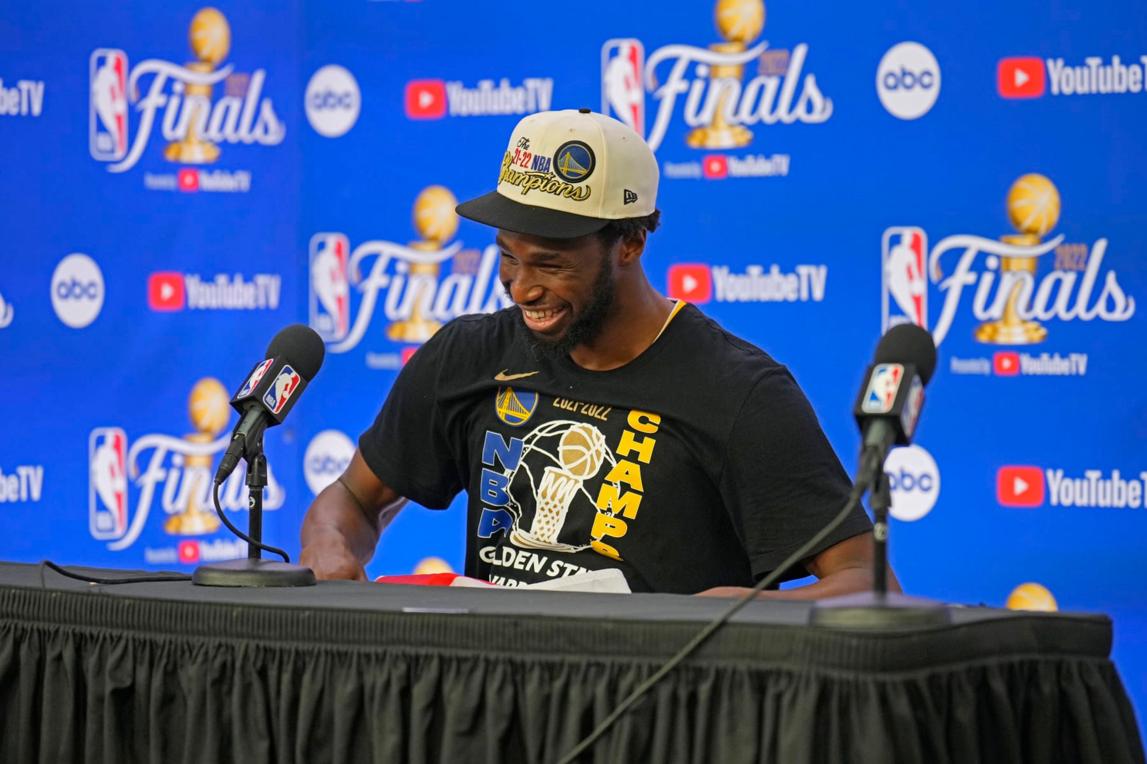 BOSTON, MA - JUNE 16: Andrew Wiggins #22 of the Golden State Warriors speaks to the media during a press conference after winning Game Six of the 2022 NBA Finals against the Boston Celtics on June 16, 2022 at TD Garden in Boston, Massachusetts. NOTE TO USER: User expressly acknowledges and agrees that, by downloading and or using this photograph, user is consenting to the terms and conditions of Getty Images License Agreement. Mandatory Copyright Notice: Copyright 2022 NBAE (Photo by Mark Blinch/NBAE via Getty Images) BOSTON, MA - JUNE 16: Andrew Wiggins #22 of the Golden State Warriors speaks to the media during a press conference after winning Game Six of the 2022 NBA Finals against the Boston Celtics on June 16, 2022 at TD Garden in Boston, Massachusetts. NOTE TO USER: User expressly acknowledges and agrees that, by downloading and or using this photograph, user is consenting to the terms and conditions of Getty Images License Agreement. Mandatory Copyright Notice: Copyright 2022 NBAE (Photo by Mark Blinch/NBAE via Getty Images)