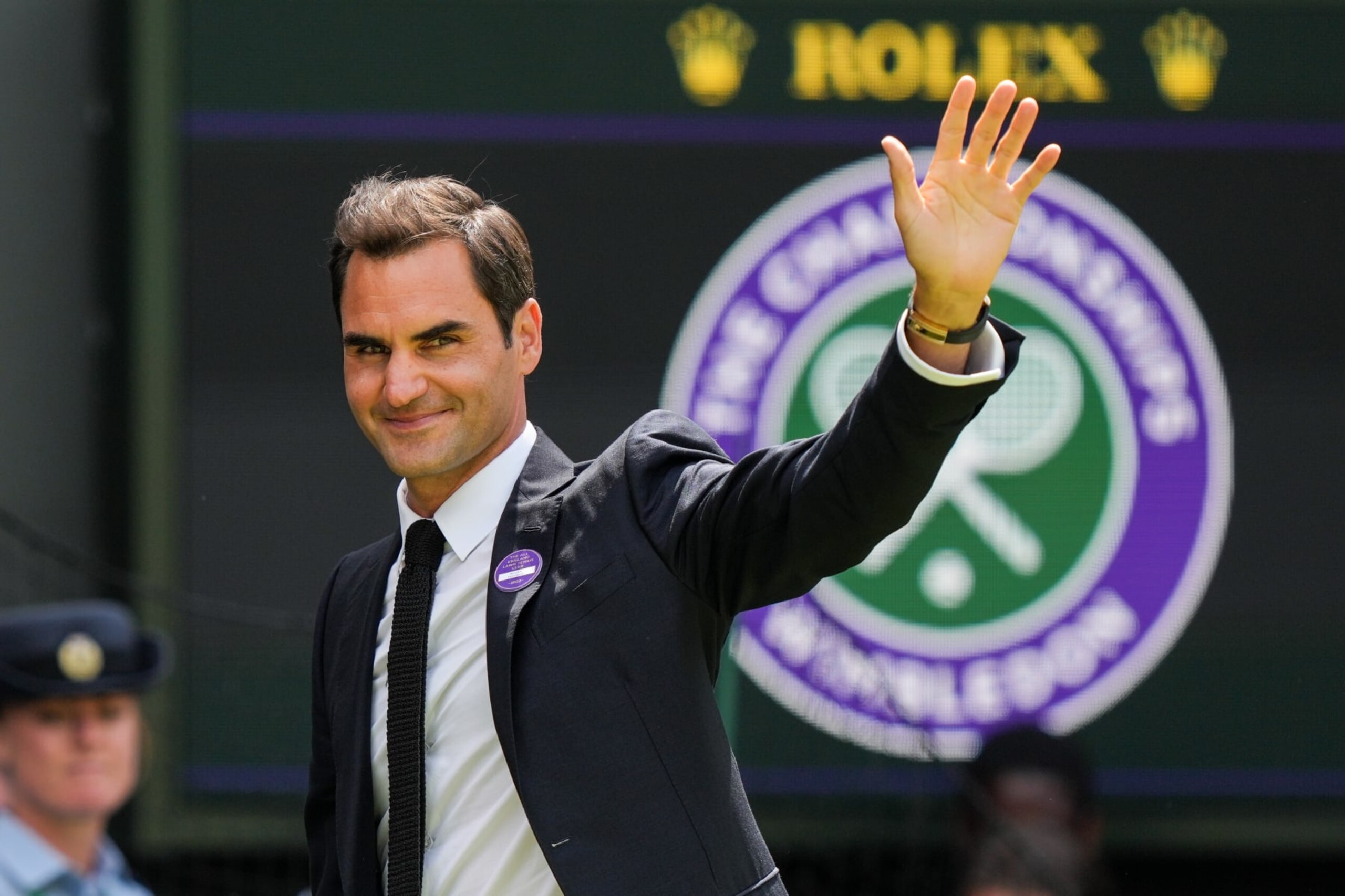 LONDON, ENGLAND - JULY 03: Roger Federer of Switzerland greets the audience during the Centre Court Centenary Celebration during day seven of The Championships Wimbledon 2022 at All England Lawn Tennis and Croquet Club on July 03, 2022 in London, England. (Photo by Shi Tang/Getty Images)