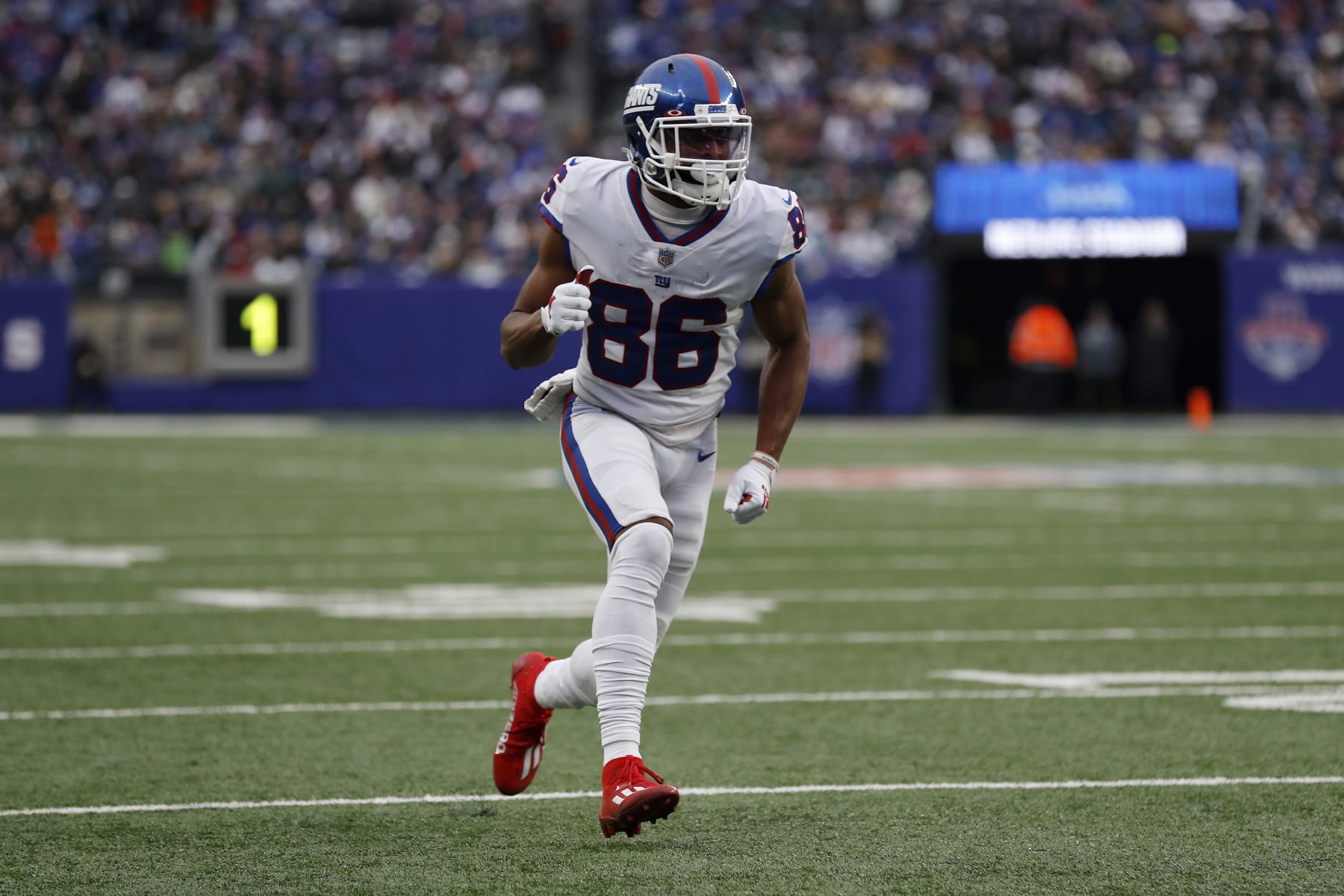 New York Giants wide receiver Darius Slayton (86) runs a route during an NFL football game against the Philadelphia Eagles, Sunday, Nov. 28, 2021, in East Rutherford, N.J. The New York Giants defeated the Philadelphia Eagles 13-7. (AP Photo/Steve Luciano)
