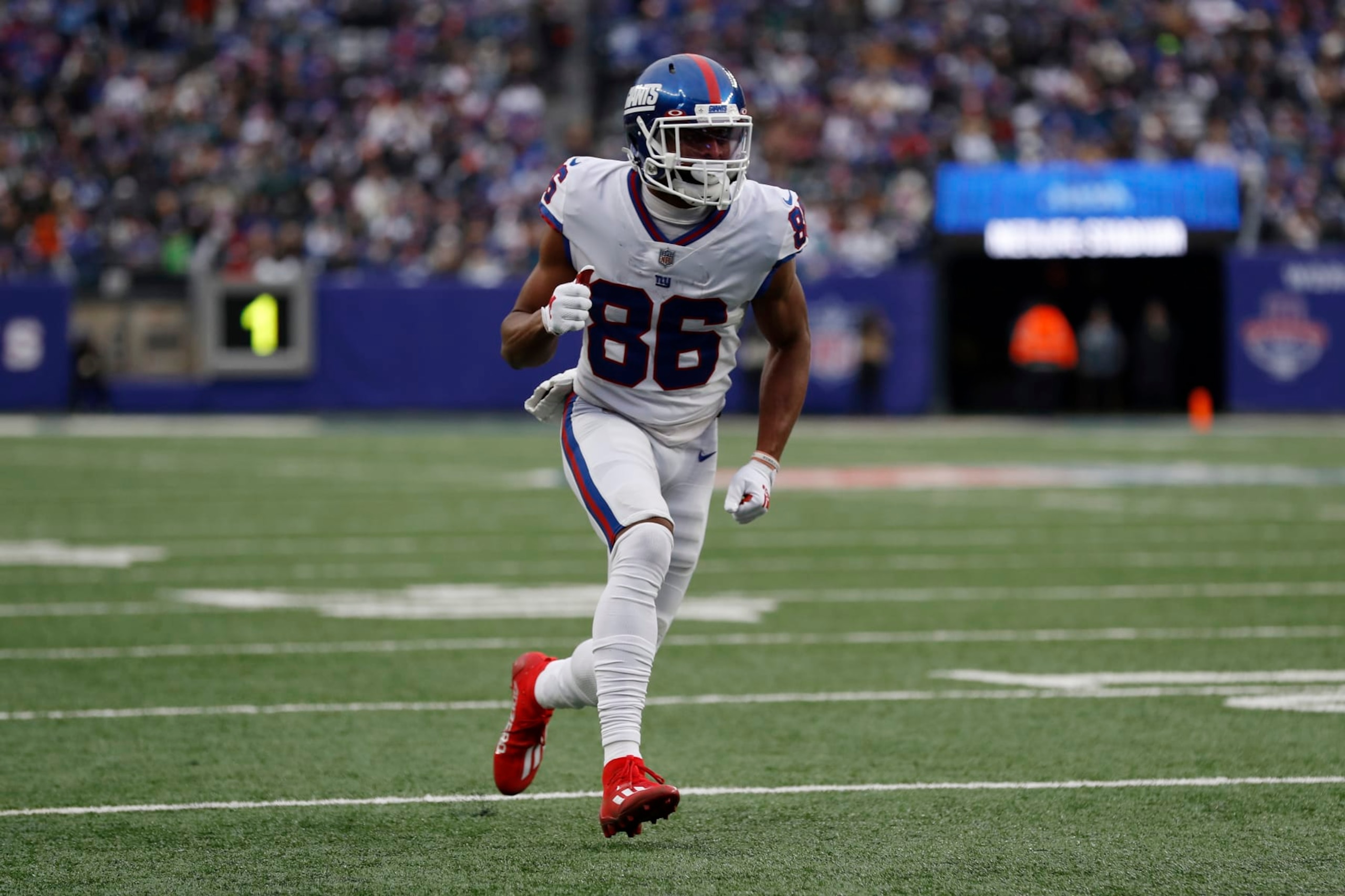New York Giants wide receiver Darius Slayton (86) runs a route during an NFL football game against the Philadelphia Eagles, Sunday, Nov. 28, 2021, in East Rutherford, N.J. The New York Giants defeated the Philadelphia Eagles 13-7. (AP Photo/Steve Luciano)