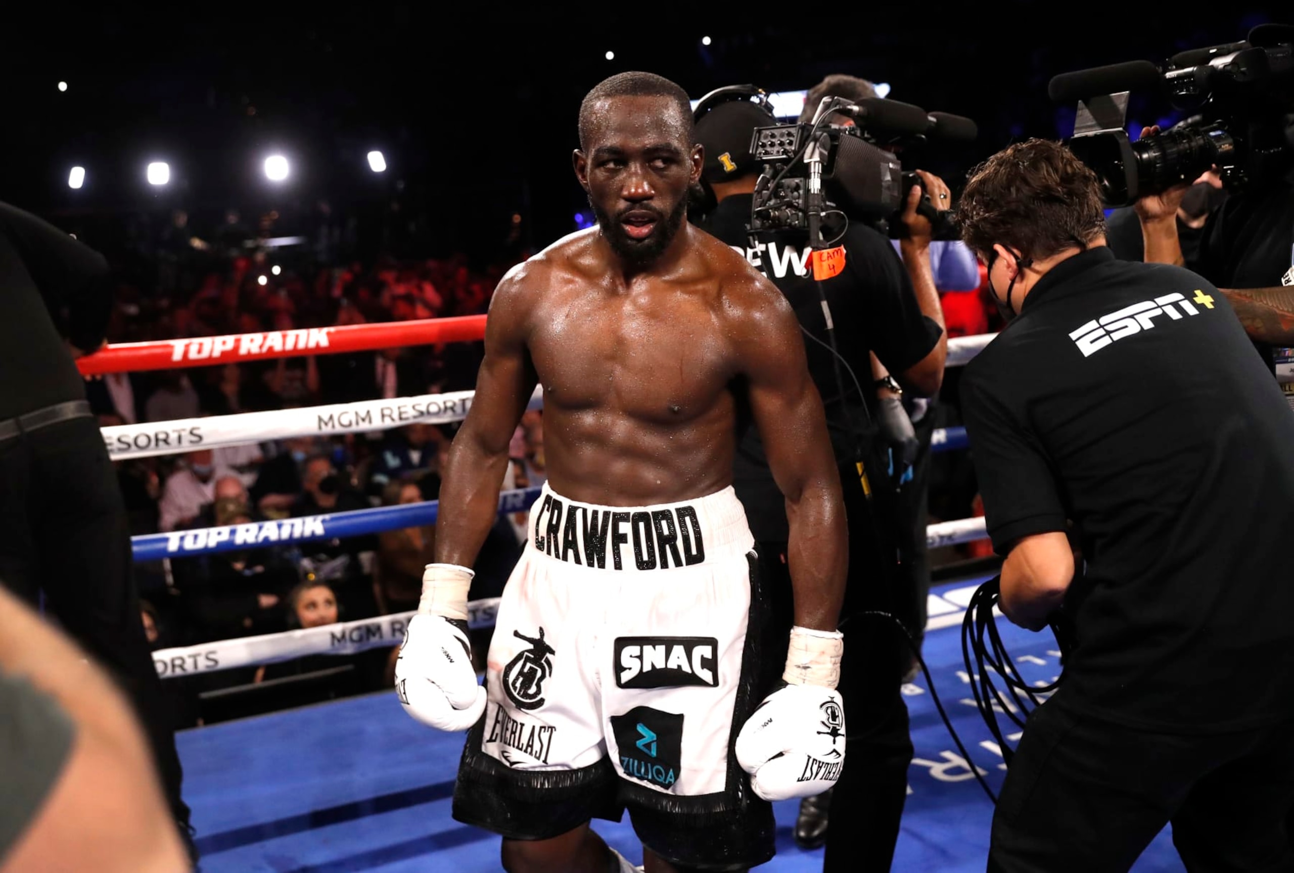 LAS VEGAS, NEVADA - NOVEMBER 20: WBO champion Terence Crawford walks in the ring after defeating Shawn Porter in a welterweight title fight at Michelob ULTRA Arena on November 20, 2021 in Las Vegas, Nevada. Crawford retained his title with a 10th-round TKO. (Photo by Steve Marcus/Getty Images) LAS VEGAS, NEVADA - NOVEMBER 20: WBO champion Terence Crawford walks in the ring after defeating Shawn Porter in a welterweight title fight at Michelob ULTRA Arena on November 20, 2021 in Las Vegas, Nevada. Crawford retained his title with a 10th-round TKO. (Photo by Steve Marcus/Getty Images)