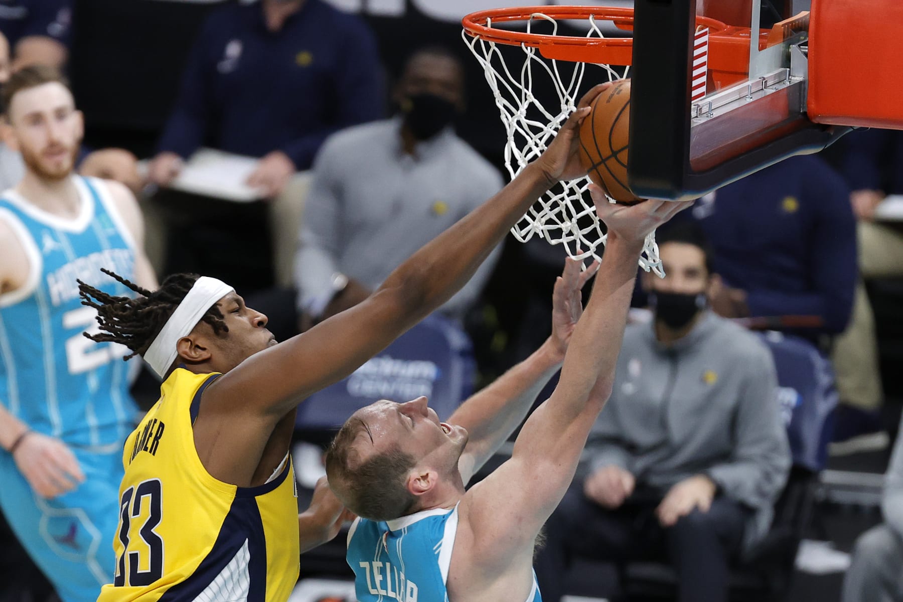 CHARLOTTE, NORTH CAROLINA - JANUARY 29: Myles Turner #33 of the Indiana Pacers blocks a shot attempt from Cody Zeller #40 of the Charlotte Hornets during the fourth quarter of their game at Spectrum Center on January 29, 2021 in Charlotte, North Carolina. NOTE TO USER: User expressly acknowledges and agrees that, by downloading and or using this photograph, User is consenting to the terms and conditions of the Getty Images License Agreement. (Photo by Jared C. Tilton/Getty Images)