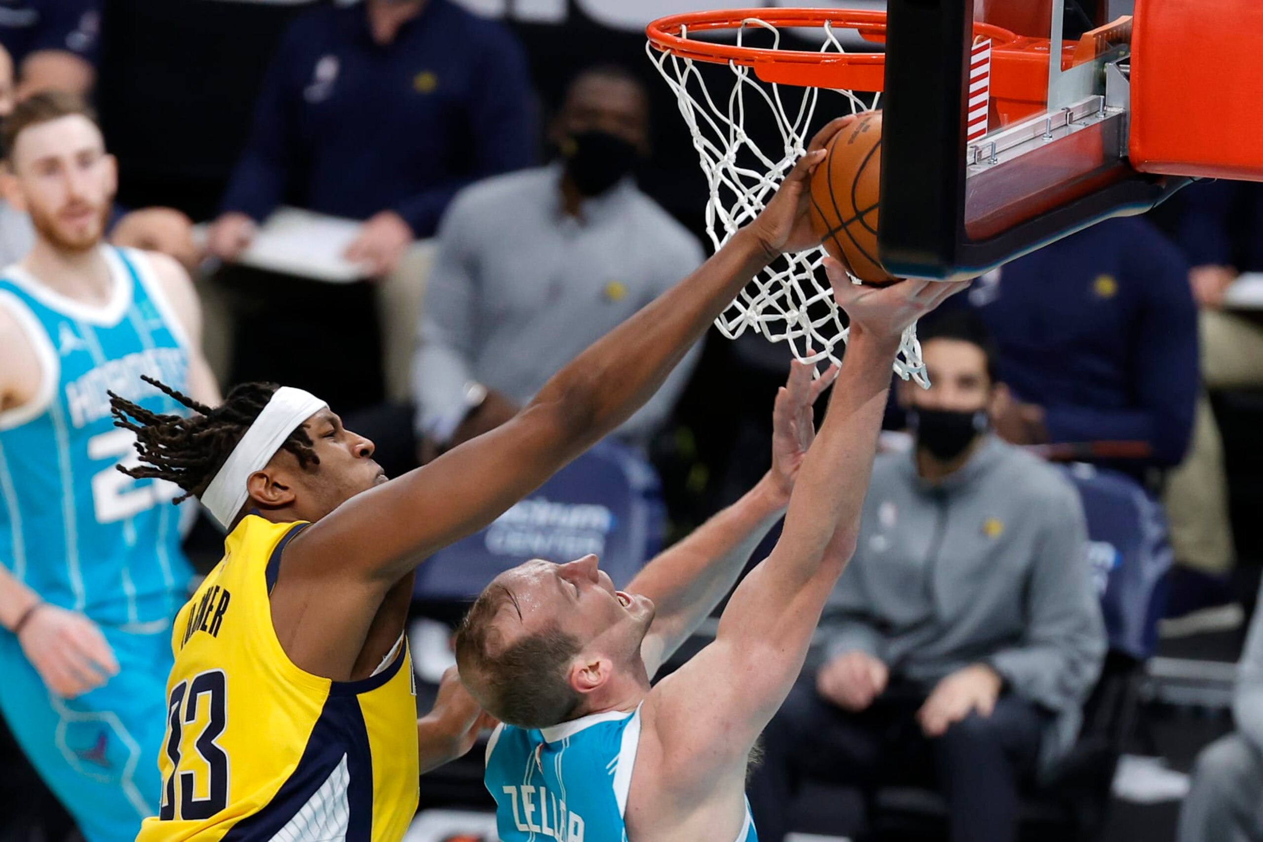 CHARLOTTE, NORTH CAROLINA - JANUARY 29: Myles Turner #33 of the Indiana Pacers blocks a shot attempt from Cody Zeller #40 of the Charlotte Hornets during the fourth quarter of their game at Spectrum Center on January 29, 2021 in Charlotte, North Carolina. NOTE TO USER: User expressly acknowledges and agrees that, by downloading and or using this photograph, User is consenting to the terms and conditions of the Getty Images License Agreement. (Photo by Jared C. Tilton/Getty Images)