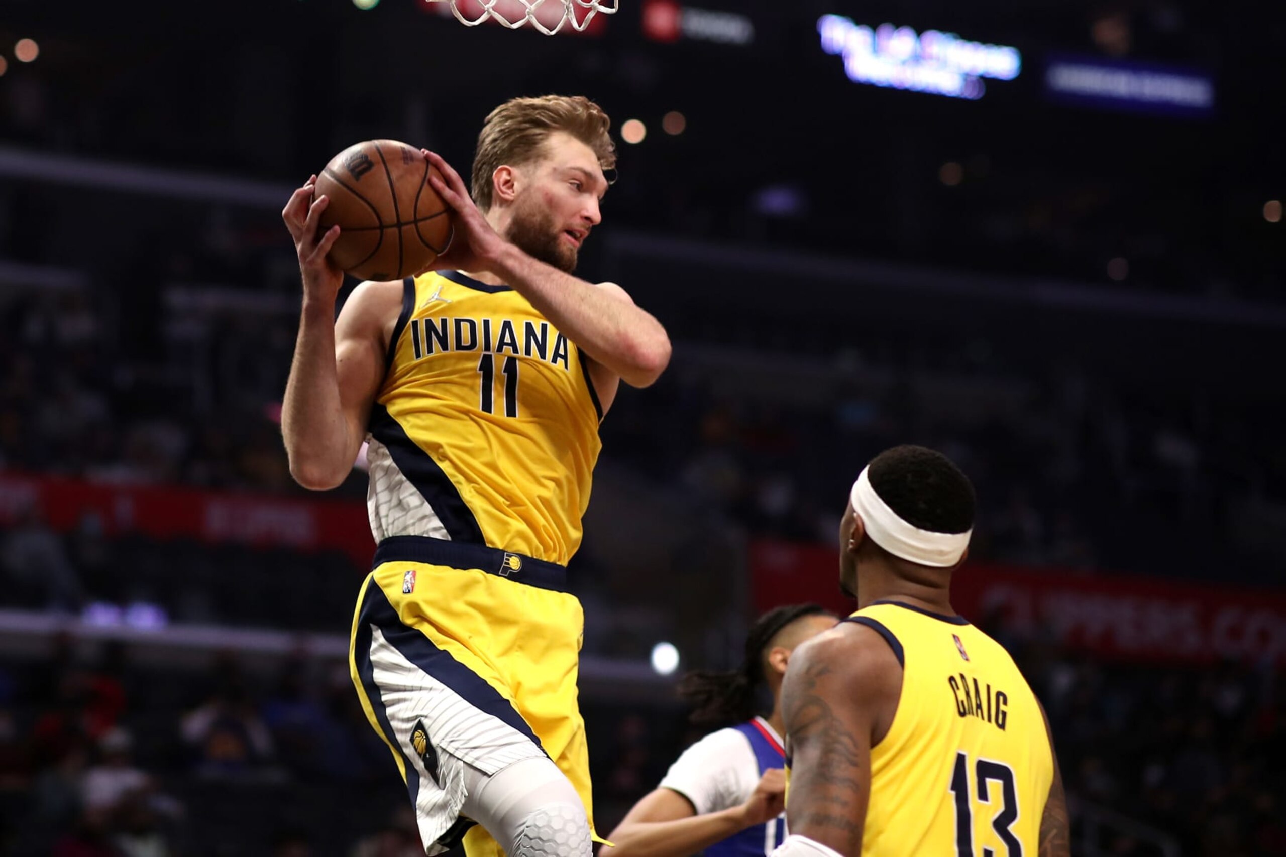 LOS ANGELES, CALIFORNIA - JANUARY 17: Domantas Sabonis #11 of the Indiana Pacers grabs the rebound during the second quarter against the Los Angeles Clippers at Crypto.com Arena on January 17, 2022 in Los Angeles, California. NOTE TO USER: User expressly acknowledges and agrees that, by downloading and/or using this photograph, User is consenting to the terms and conditions of the Getty Images License Agreement. (Photo by Katelyn Mulcahy/Getty Images)