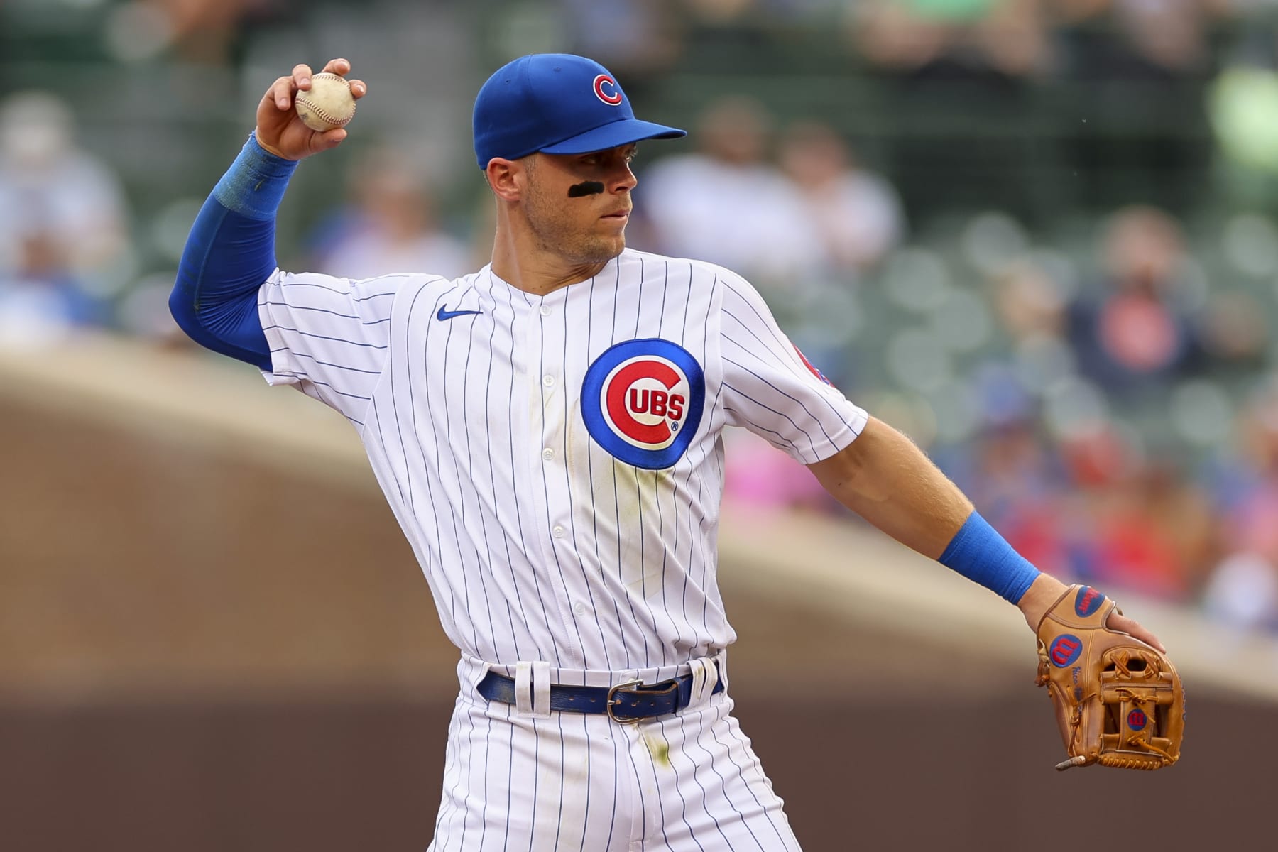 CHICAGO, IL - AUGUST 25: Chicago Cubs shortstop Nico Hoerner (2) throws the ball during a regular season game between the St. Louis Cardinals and Chicago Cubs on August 25, 2022, at Wrigley Field in Chicago, IL. (Photo by Brandon Sloter/Icon Sportswire via Getty Images)