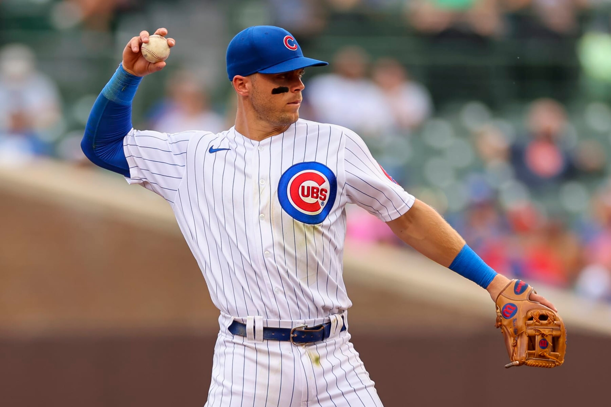 CHICAGO, IL - AUGUST 25: Chicago Cubs shortstop Nico Hoerner (2) throws the ball during a regular season game between the St. Louis Cardinals and Chicago Cubs on August 25, 2022, at Wrigley Field in Chicago, IL. (Photo by Brandon Sloter/Icon Sportswire via Getty Images)