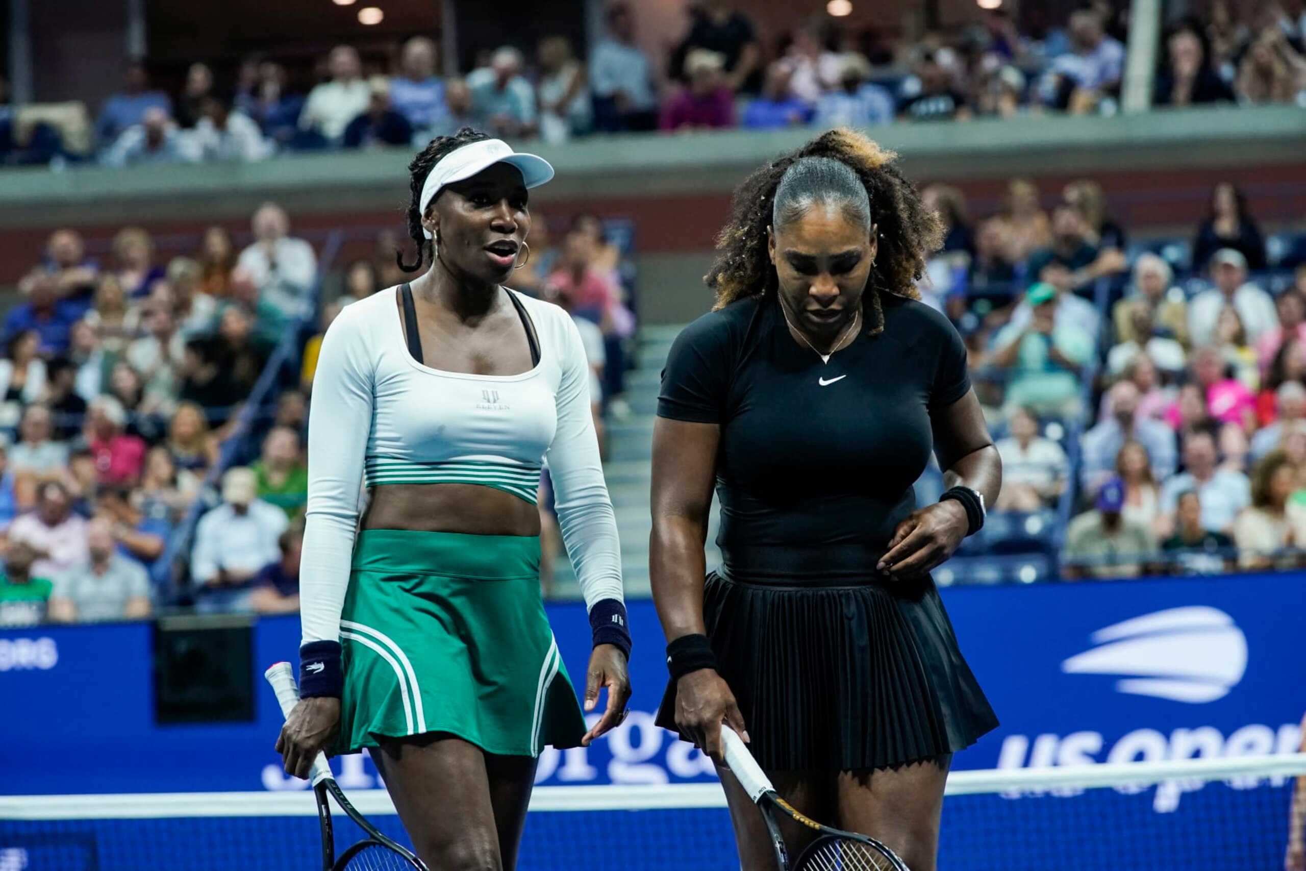 NEW YORK - NEW YORK - SEPTEMBER 1: Serena Williams and Venus Williams of the United States talk on court after losing a point during their Women's Doubles First Round against Linda Noskova and Lucie Hradecka of the Czech Republic on the 2022 U.S. Open Tennis Tournament on September 1, 2022. In New York. (Photo by Eduardo MunozAlvarez/VIEWpress)