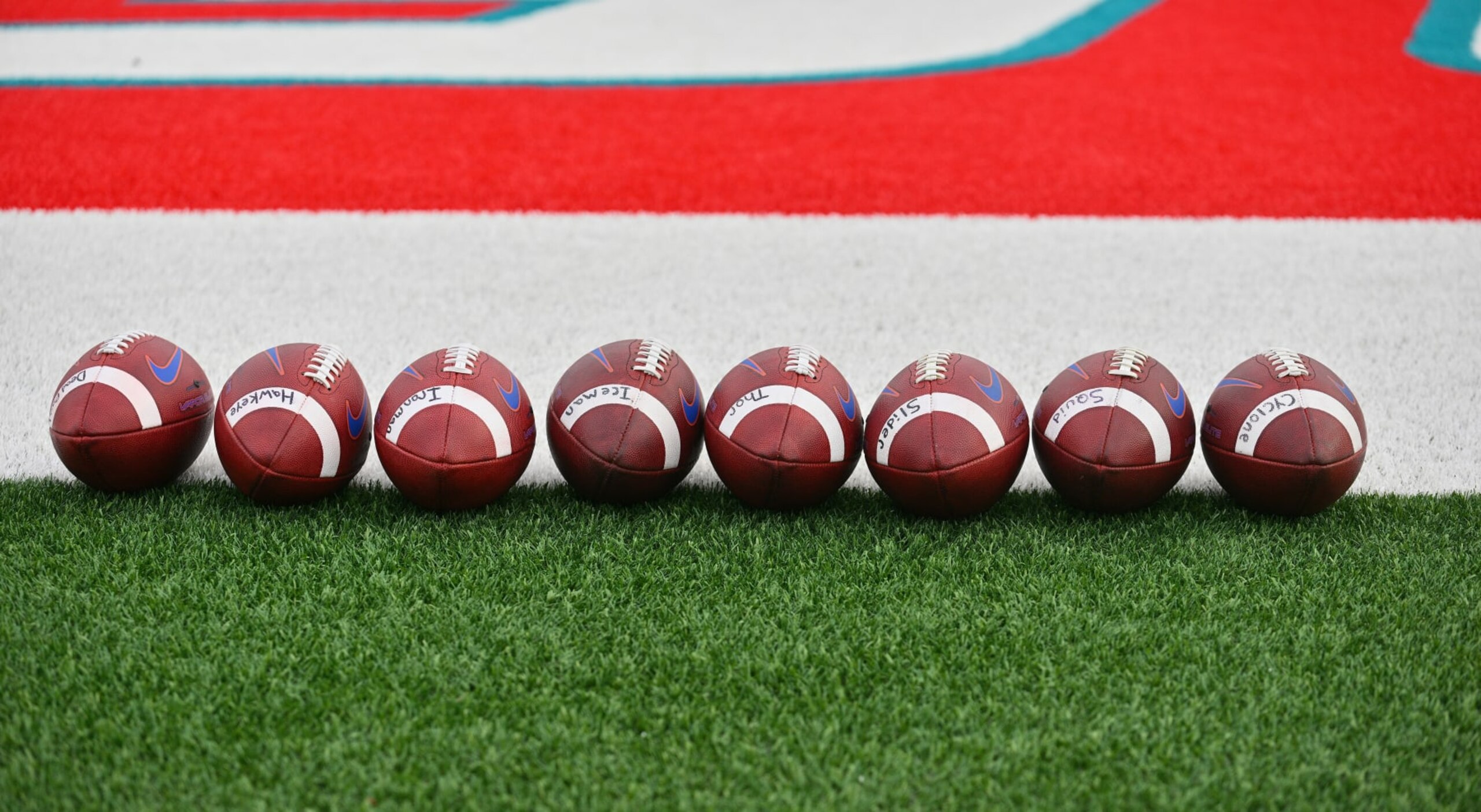 ALBUQUERQUE, NEW MEXICO - SEPTEMBER 09:  Nike footballs are lined up on the field before a game between the Boise State Broncos and the New Mexico Lobos at University Stadium on September 09, 2022 in Albuquerque, New Mexico.  (Photo by Sam Wasson/Getty Images)