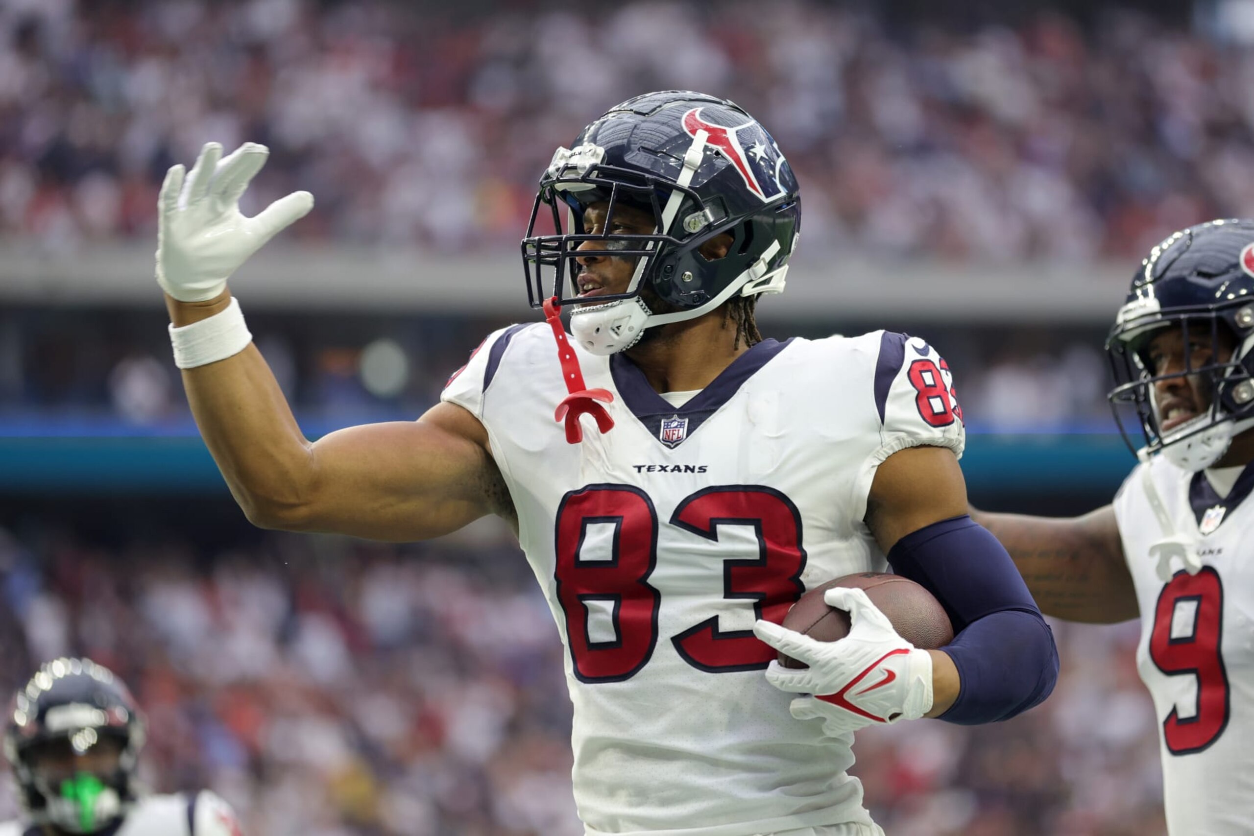 HOUSTON, TEXAS - SEPTEMBER 11: O.J. Howard #83 of the Houston Texans celebrates scoring a touchdown during the third quarter against the Indianapolis Colts at NRG Stadium on September 11, 2022 in Houston, Texas. (Photo by Carmen Mandato/Getty Images)