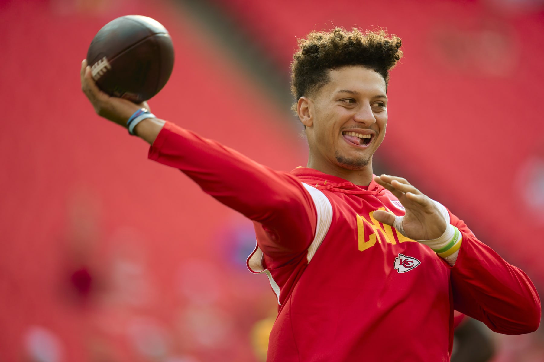 KANSAS CITY, MO - SEPTEMBER 15: Patrick Mahomes #15 of the Kansas City Chiefs warms up before kickoff against the Los Angeles Chargers at GEHA Field at Arrowhead Stadium on September 15, 2022 in Kansas City, Missouri. (Photo by Cooper Neill/Getty Images)