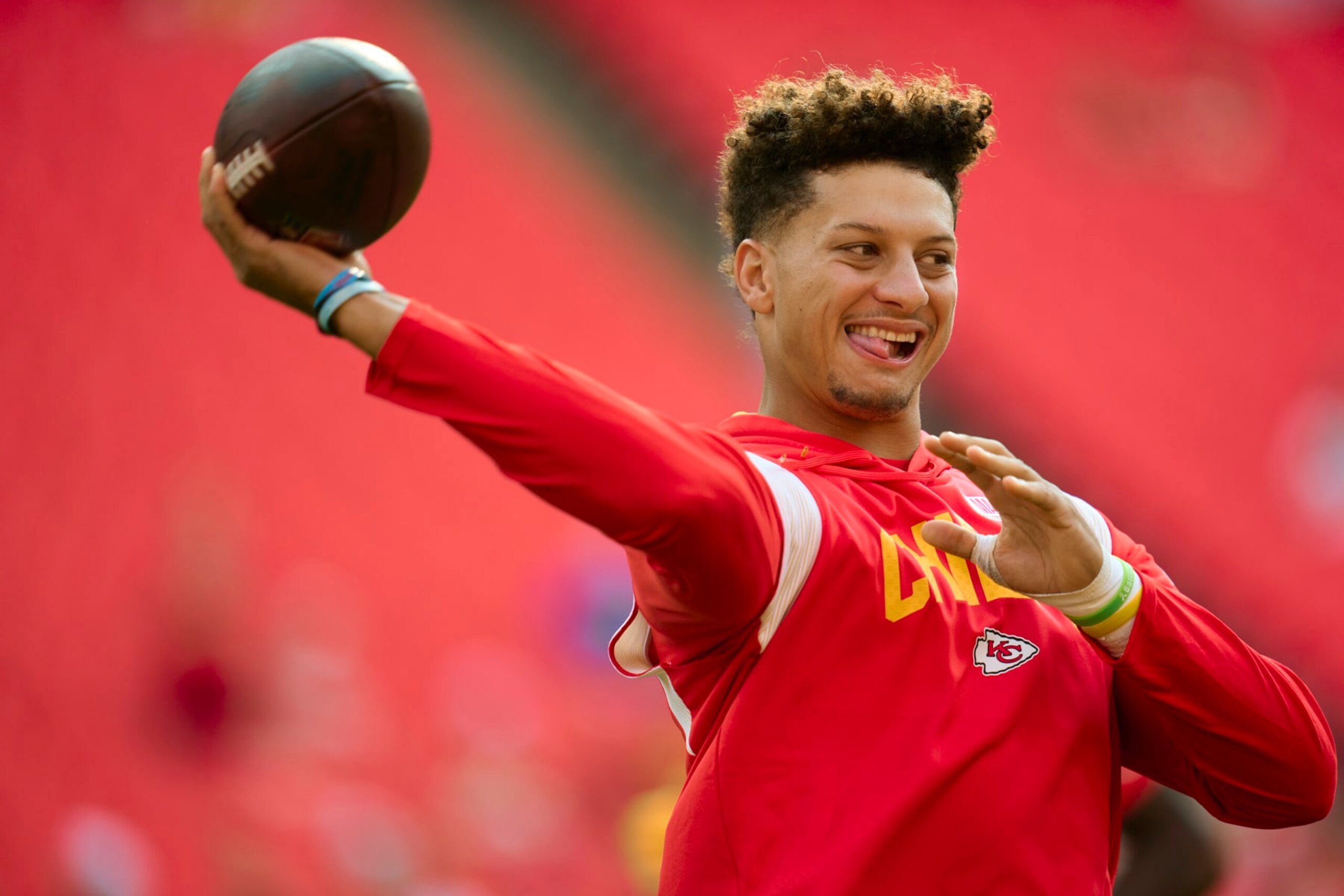 KANSAS CITY, MO - SEPTEMBER 15: Patrick Mahomes #15 of the Kansas City Chiefs warms up before kickoff against the Los Angeles Chargers at GEHA Field at Arrowhead Stadium on September 15, 2022 in Kansas City, Missouri. (Photo by Cooper Neill/Getty Images)