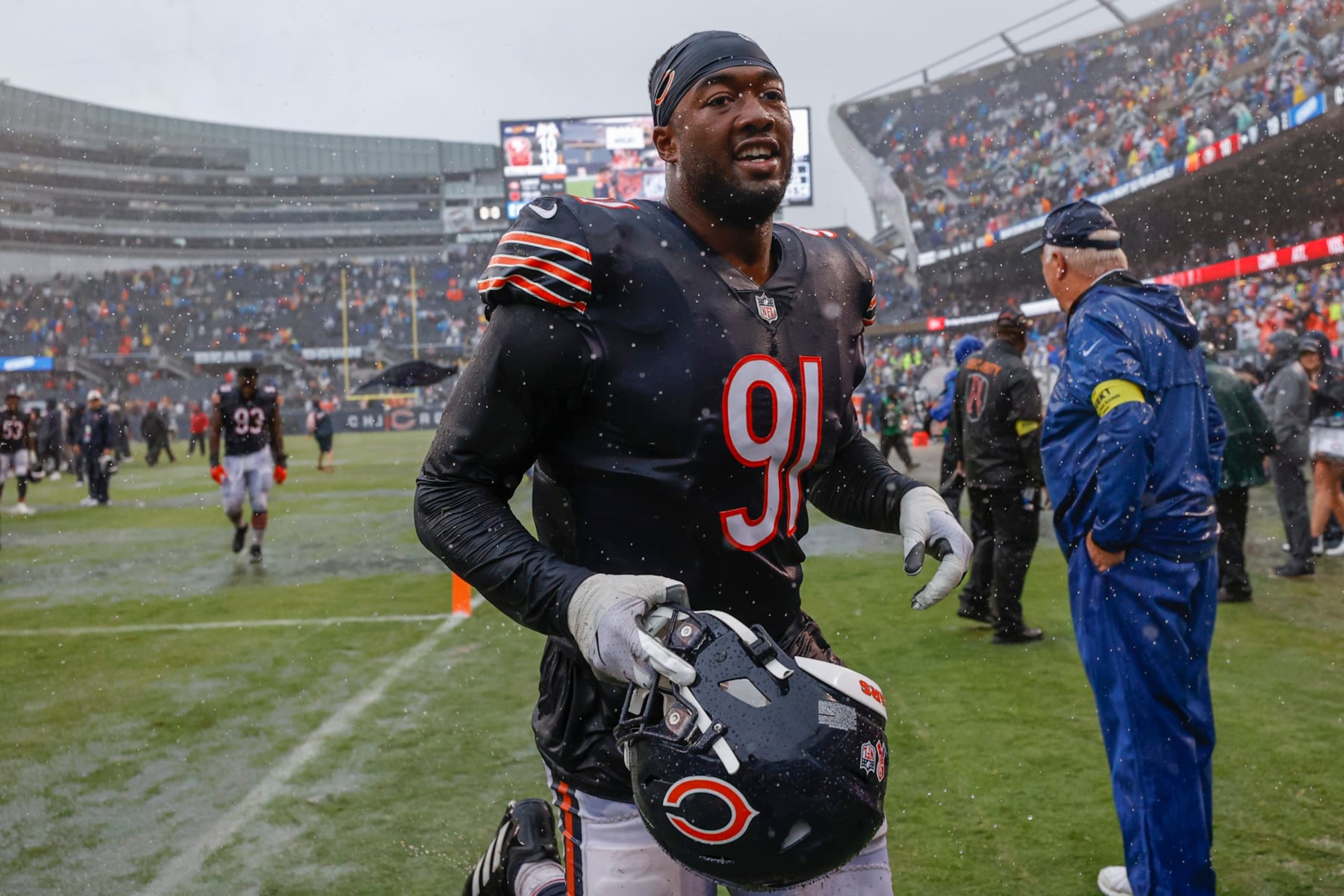Chicago Bears defensive end Dominique Robinson (91) celebrates the Bears win against the San Francisco 49ers in an NFL football game, Sunday, Sept. 11, 2022, in Chicago. (AP Photo/Kamil Krzaczynski)