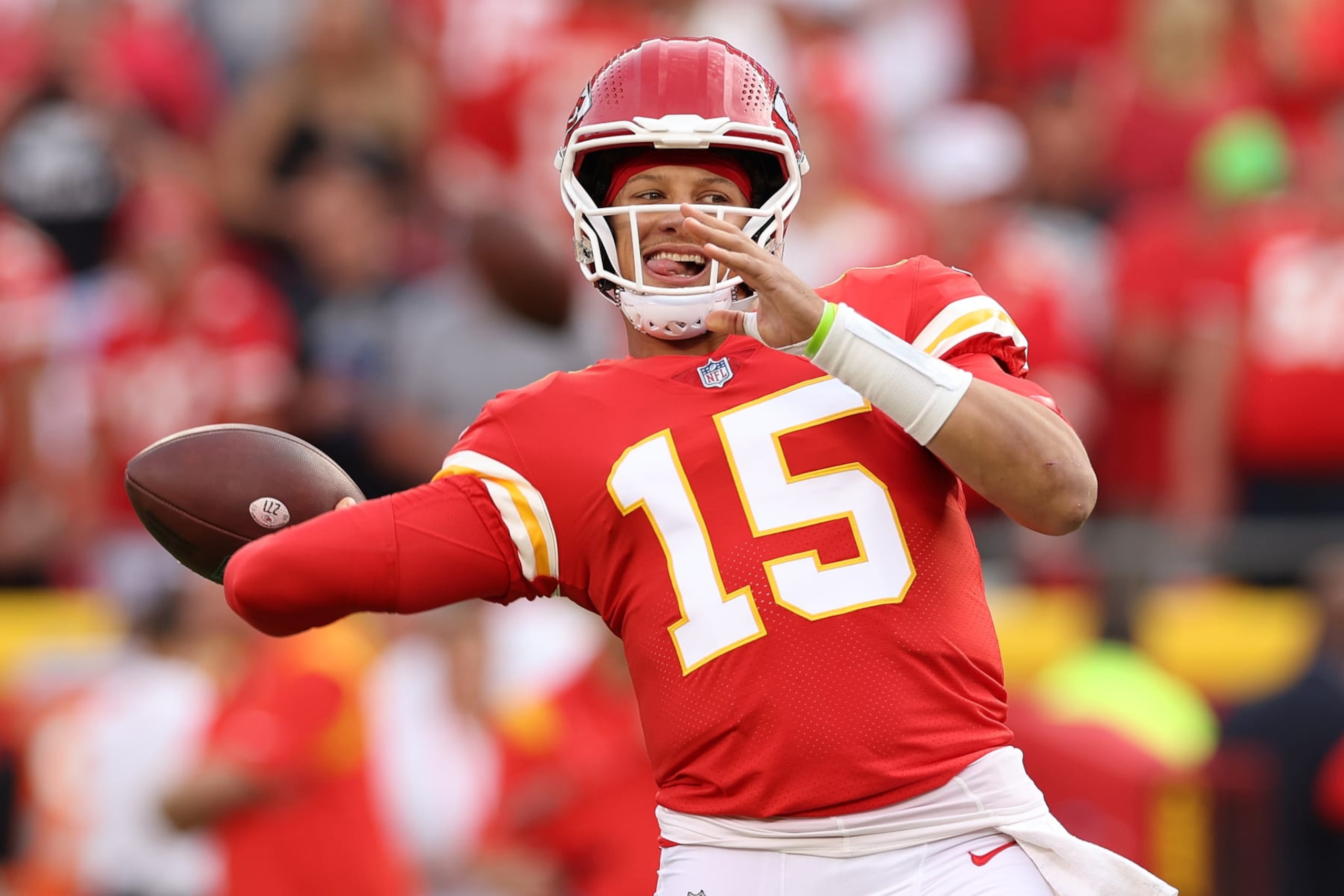 KANSAS CITY, MISSOURI - SEPTEMBER 15: Patrick Mahomes #15 of the Kansas City Chiefs warms-up before the game against the Los Angeles Chargers at Arrowhead Stadium on September 15, 2022 in Kansas City, Missouri. (Photo by Jamie Squire/Getty Images)