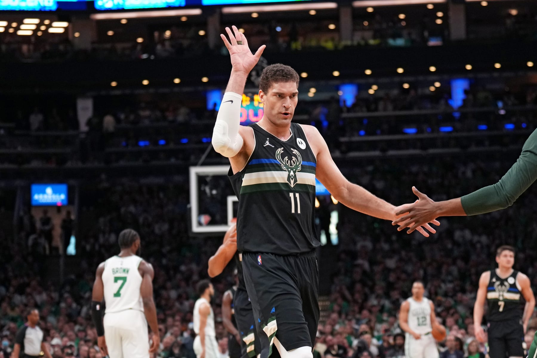 BOSTON, MA - MAY 15: Brook Lopez #11 of the Milwaukee Bucks reacts during Game 7 of the 2022 NBA Playoffs Eastern Conference Semifinals on May 15, 2022 at TD Garden in Boston, Massachusets. NOTE TO USER: User expressly acknowledges and agrees that, by downloading and/or using this Photograph, user is consenting to the terms and conditions of the Getty Images License Agreement. Mandatory Copyright Notice: Copyright 2022 NBAE (Photo by Jesse D. Garrabrant/NBAE via Getty Images)