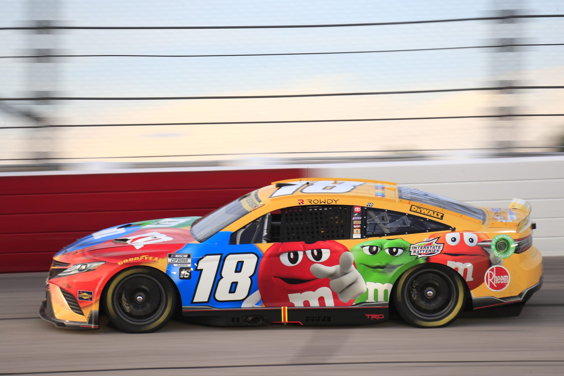 DARLINGTON, SC - SEPTEMBER 04: Kyle Busch (#18 Joe Gibbs Racing M&M's Toyota) races down the back stretch during the running of the NASCAR Cup Series Cook Out Southern 500 on September 4, 2022 at Darlington Raceway in Darlington, SC (Photo by Jeff Robinson/Icon Sportswire via Getty Images)