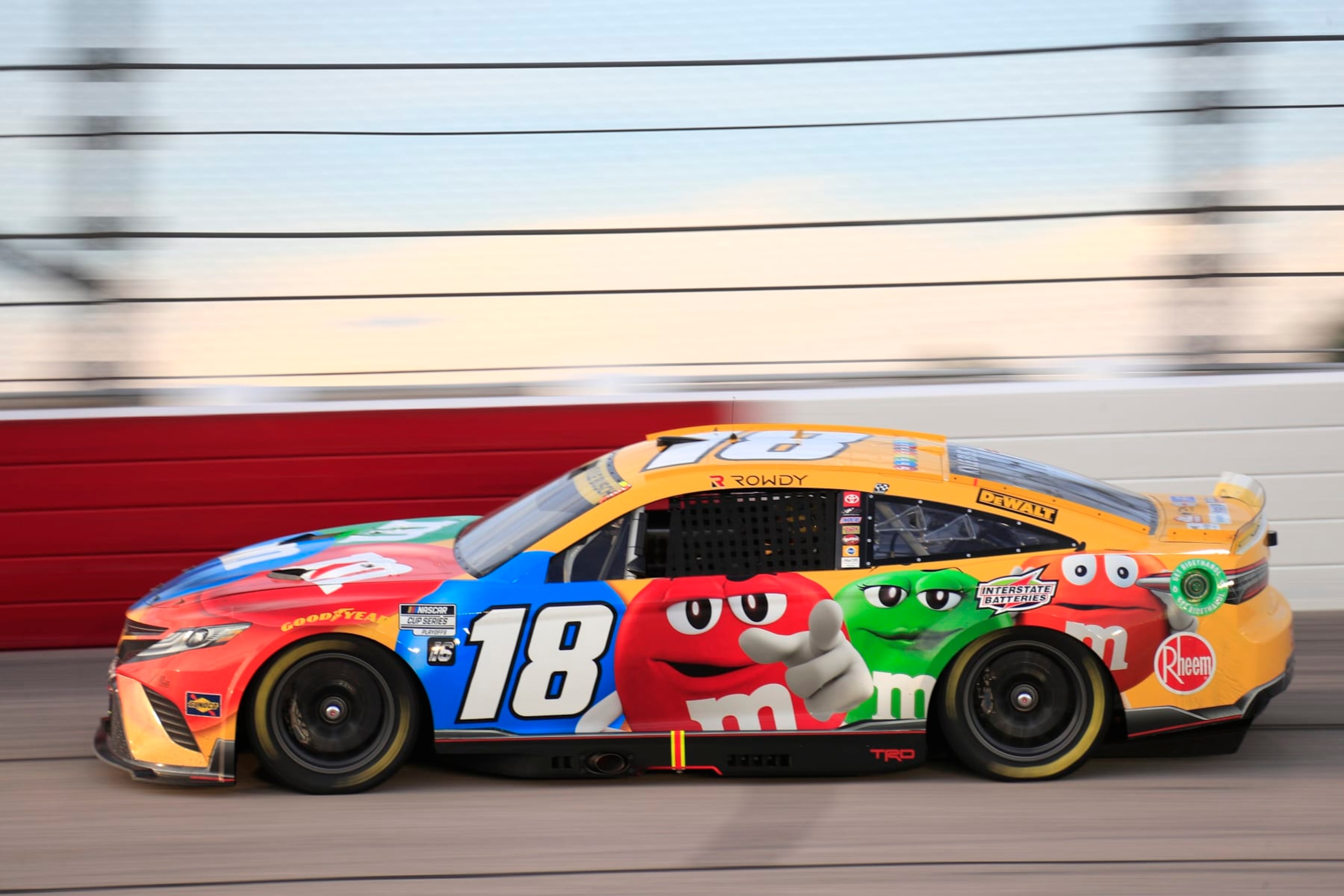 DARLINGTON, SC - SEPTEMBER 04: Kyle Busch (#18 Joe Gibbs Racing M&M's Toyota) races down the back stretch during the running of the NASCAR Cup Series Cook Out Southern 500 on September 4, 2022 at Darlington Raceway in Darlington, SC (Photo by Jeff Robinson/Icon Sportswire via Getty Images) DARLINGTON, SC - SEPTEMBER 04: Kyle Busch (#18 Joe Gibbs Racing M&M's Toyota) races down the back stretch during the running of the NASCAR Cup Series Cook Out Southern 500 on September 4, 2022 at Darlington Raceway in Darlington, SC (Photo by Jeff Robinson/Icon Sportswire via Getty Images)
