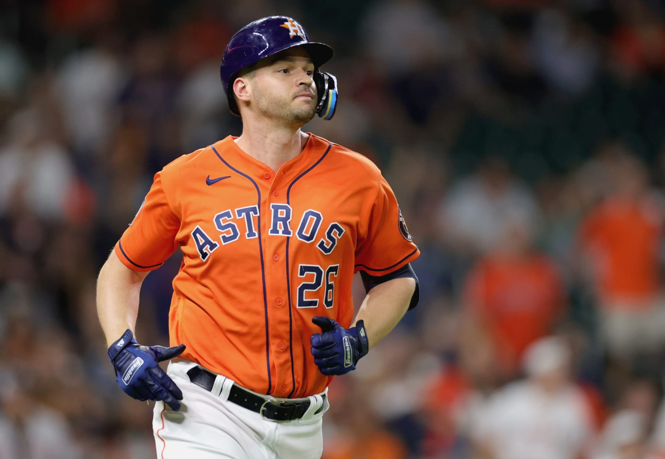 HOUSTON, TEXAS - AUGUST 26: Trey Mancini #26 of the Houston Astros flies out to right field during the fifth inning against the Baltimore Orioles at Minute Maid Park on August 26, 2022 in Houston, Texas. (Photo by Carmen Mandato/Getty Images)