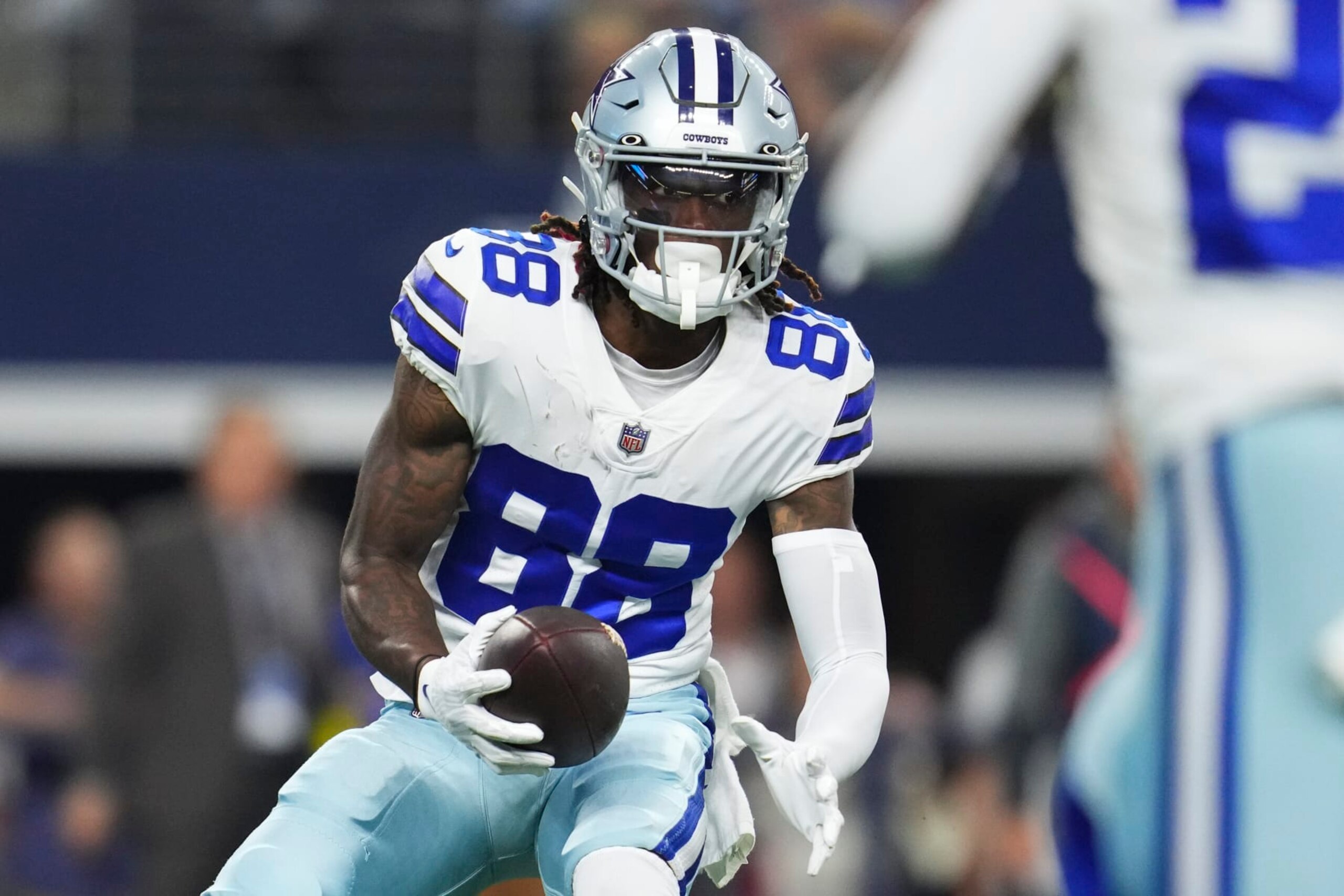 ARLINGTON, TX - SEPTEMBER 11: CeeDee Lamb #88 of the Dallas Cowboys runs the ball after making the catch against the Tampa Bay Buccaneers at AT&T Stadium on September 11, 2022 in Arlington, TX. (Photo by Cooper Neill/Getty Images)