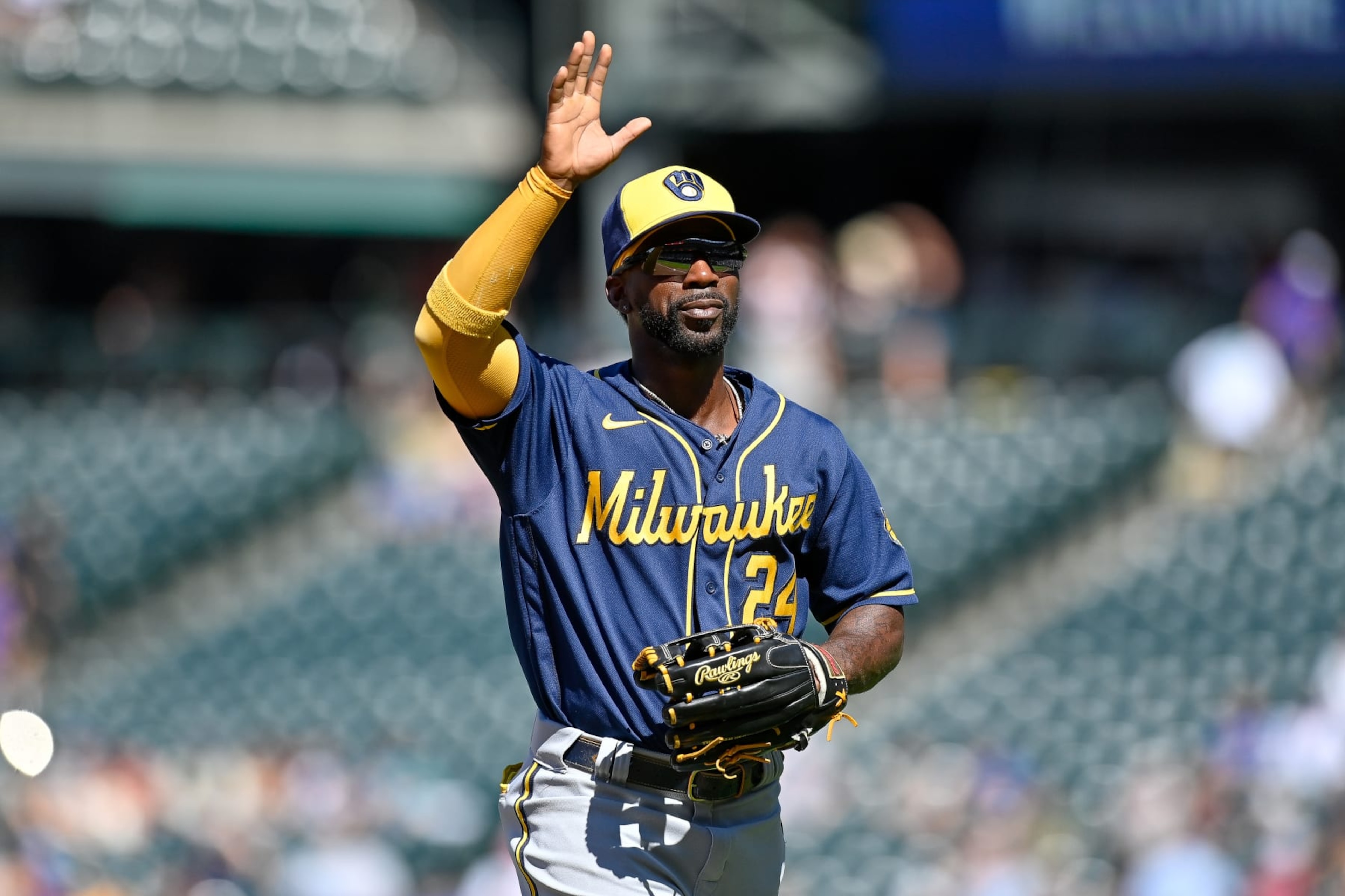 DENVER, CO - SEPTEMBER 5: Andrew McCutchen #24 of the Milwaukee Brewers waves towards the stands as he returns to the dugout after playing defense in the third inning of a game against the Colorado Rockies at Coors Field on September 5, 2022 in Denver, Colorado. (Photo by Dustin Bradford/Getty Images) DENVER, CO - SEPTEMBER 5: Andrew McCutchen #24 of the Milwaukee Brewers waves towards the stands as he returns to the dugout after playing defense in the third inning of a game against the Colorado Rockies at Coors Field on September 5, 2022 in Denver, Colorado. (Photo by Dustin Bradford/Getty Images)