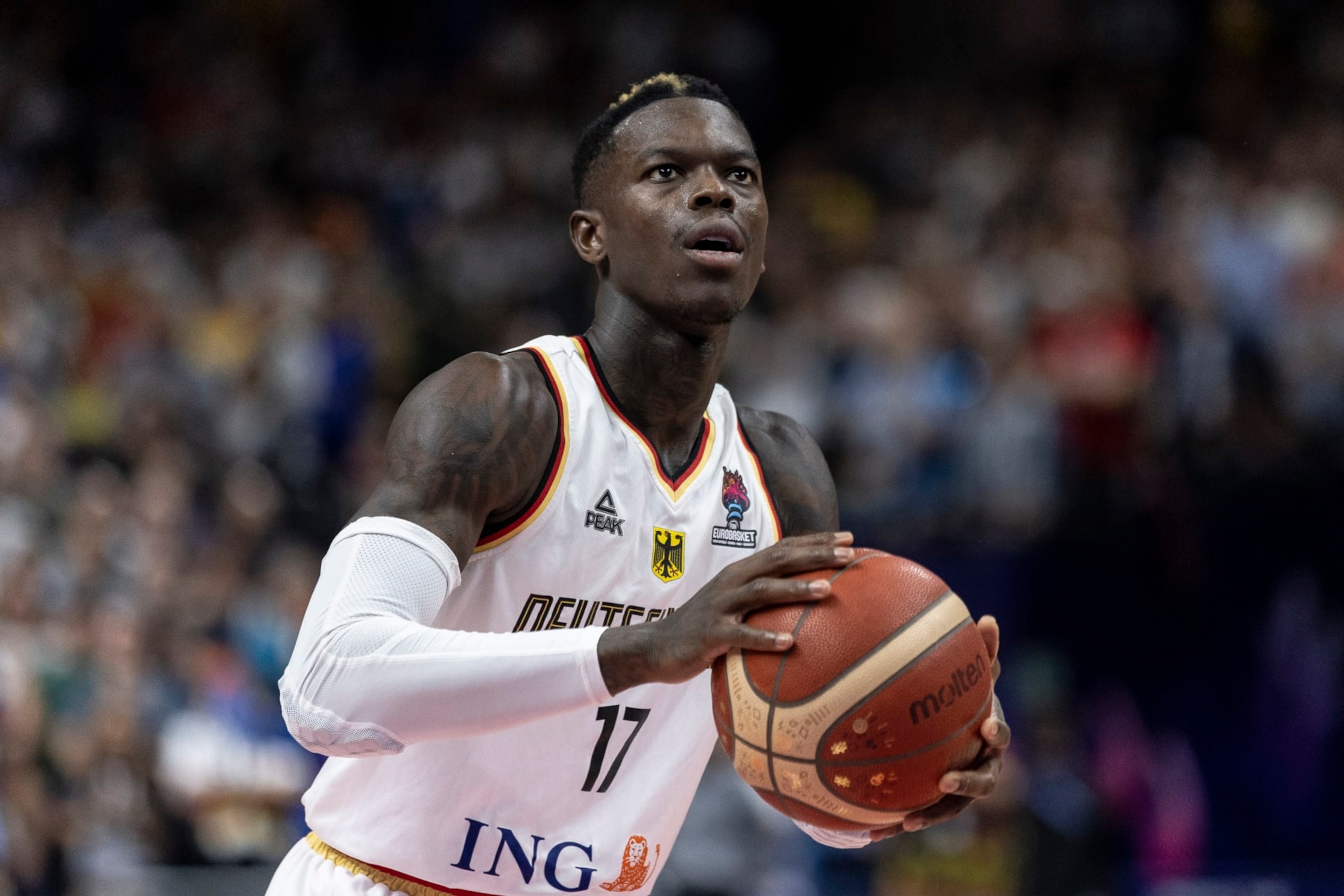 BERLIN, GERMANY - SEPTEMBER 16: Dennis Schroder of Germany shoots the ball during the FIBA EuroBasket 2022 semi-final match between Germany and Spain at EuroBasket Arena Berlin on September 16, 2022 in Berlin, Germany. (Photo by Maja Hitij/Getty Images)