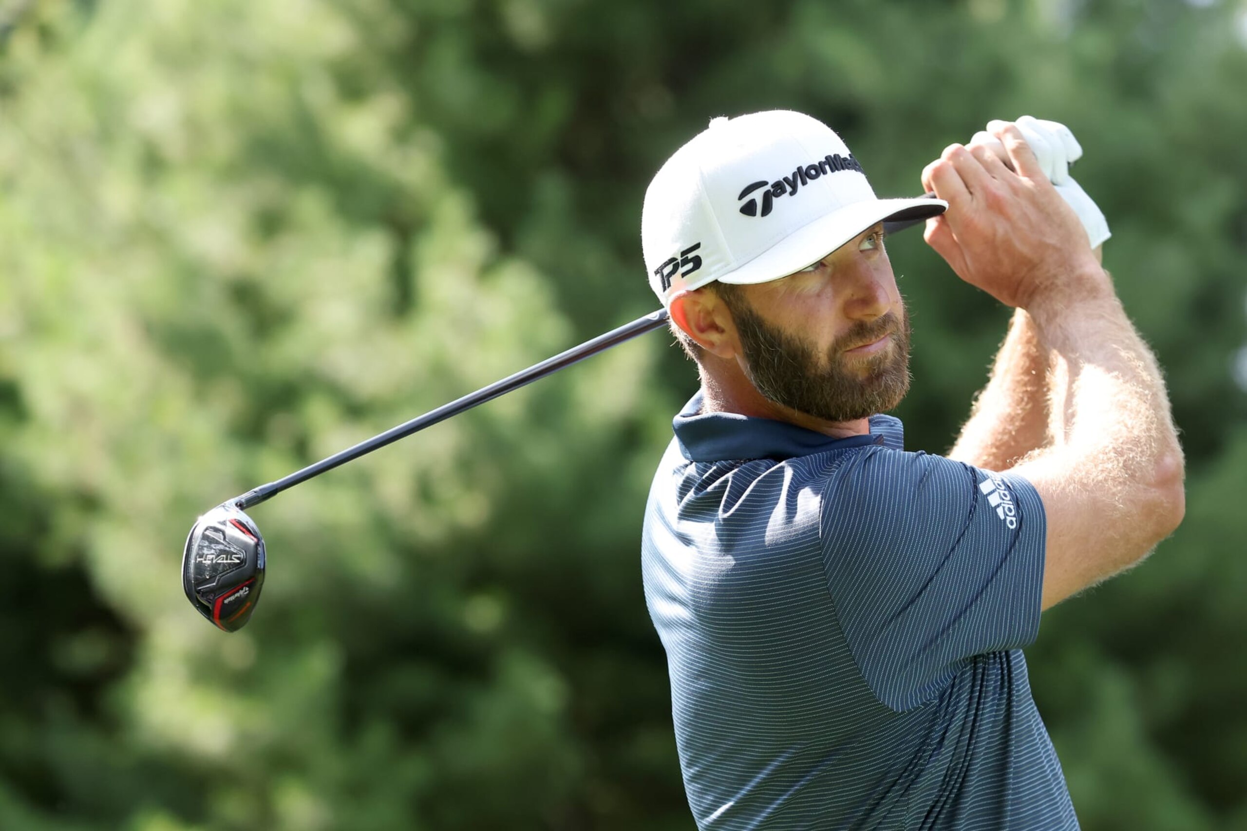 SUGAR GROVE, ILLINOIS - SEPTEMBER 16: Team Captain Dustin Johnson of 4 Aces GC plays his shot from the eighth tee during Day One of the LIV Golf Invitational - Chicago at Rich Harvest Farms on September 16, 2022 in Sugar Grove, Illinois. (Photo by Jonathan Ferrey/LIV Golf via Getty Images)