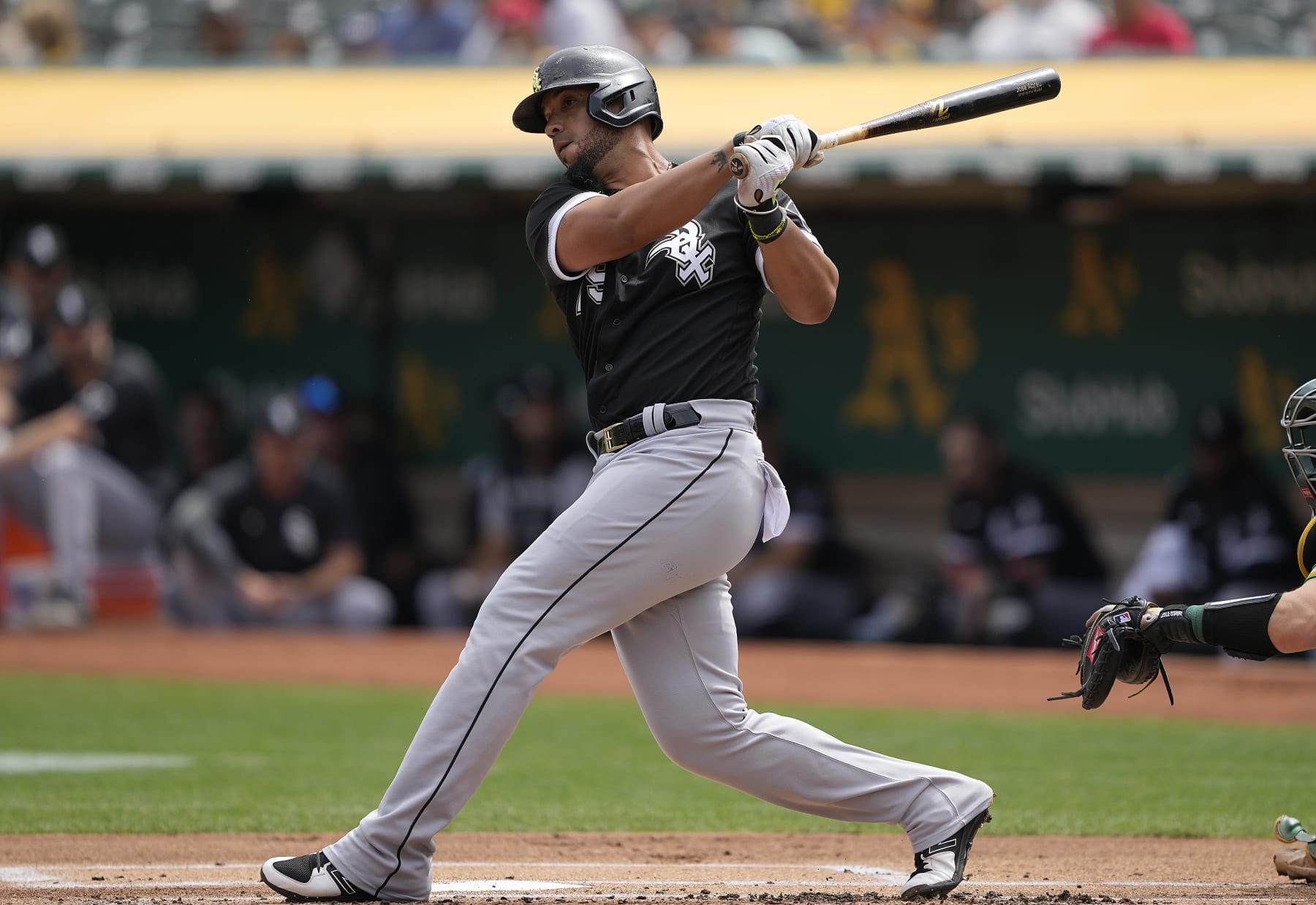 OAKLAND, CALIFORNIA - SEPTEMBER 11: Jose Abreu #79 of the Chicago White Sox hits an rbi double scoring Andrew Vaughn #25 against the Oakland Athletics in the top of the first inning at RingCentral Coliseum on September 11, 2022 in Oakland, California. (Photo by Thearon W. Henderson/Getty Images)
