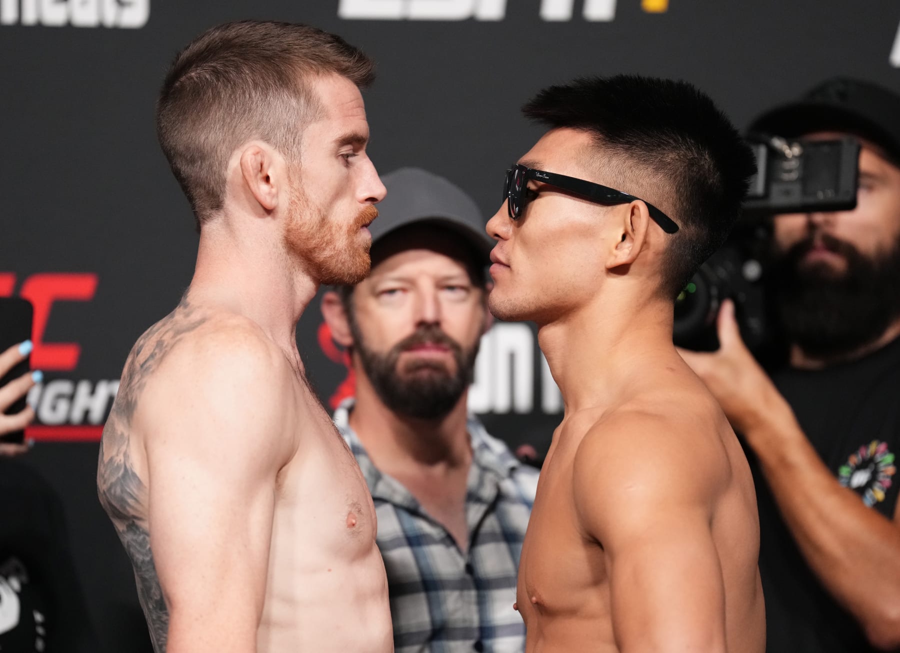 LAS VEGAS, NEVADA - SEPTEMBER 16: (L-R) Opponents Cory Sandhagen and Song Yadong of China face off at UFC APEX on September 16, 2022 in Las Vegas, Nevada. (Photo by Chris Unger/Zuffa LLC)