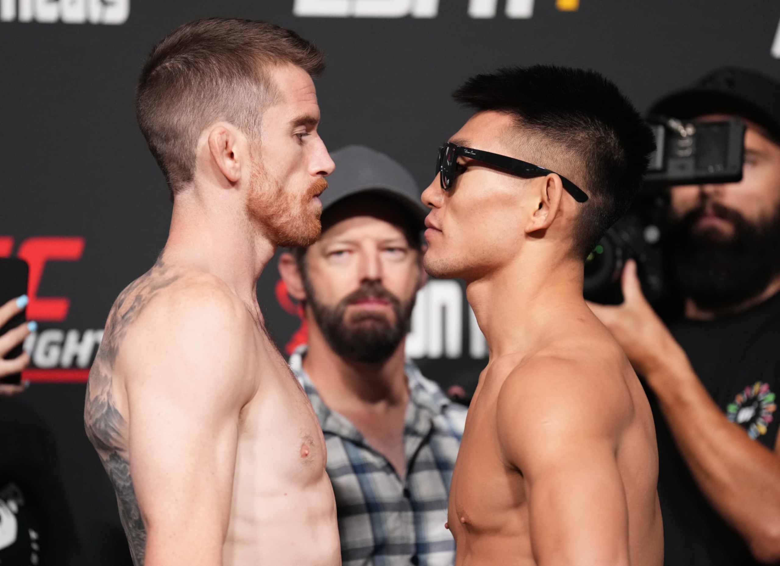 LAS VEGAS, NEVADA - SEPTEMBER 16: (L-R) Opponents Cory Sandhagen and Song Yadong of China face off at UFC APEX on September 16, 2022 in Las Vegas, Nevada. (Photo by Chris Unger/Zuffa LLC)