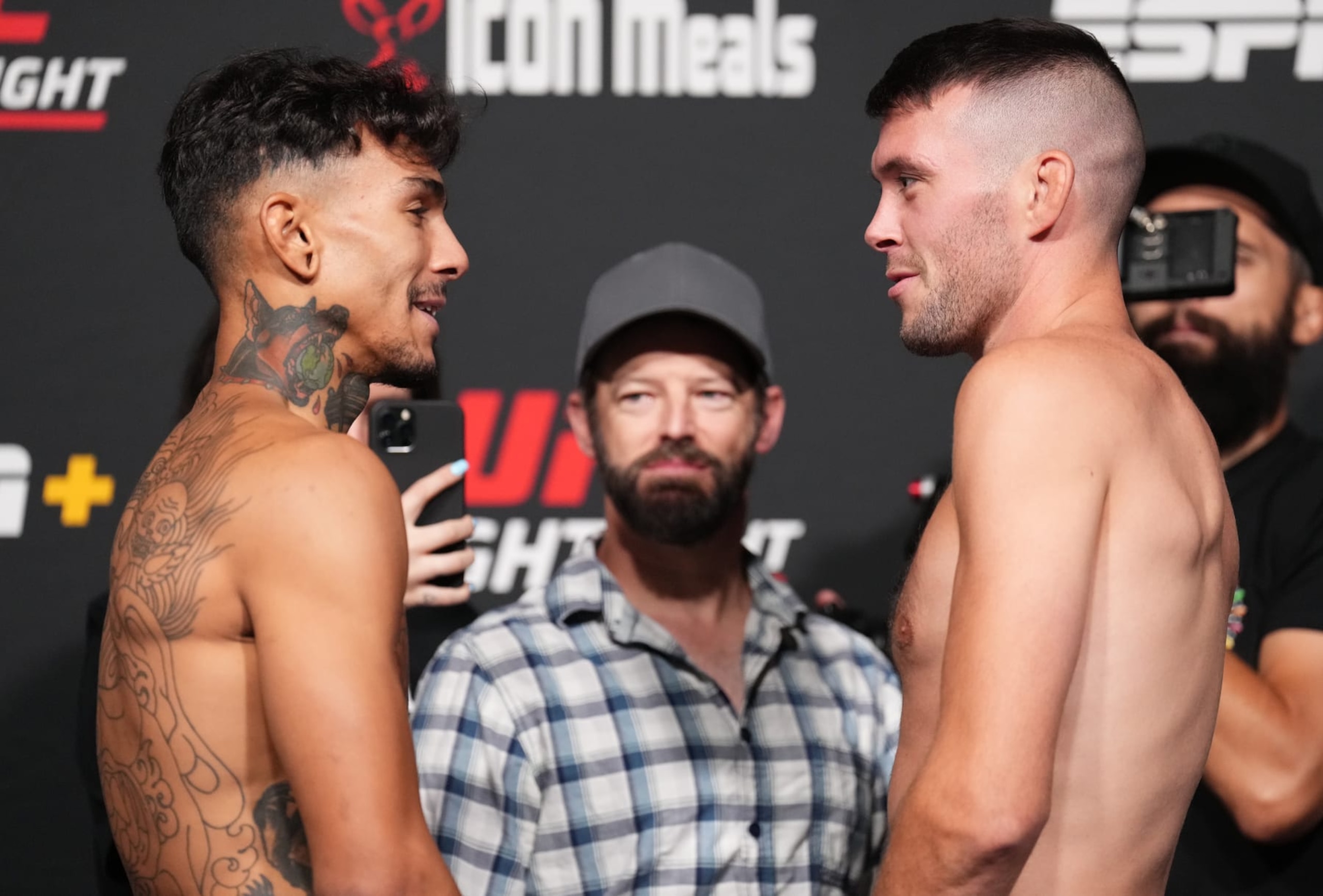 LAS VEGAS, NEVADA - SEPTEMBER 16: (L-R) Opponents Andre Fili and Bill Algeo face off at UFC APEX on September 16, 2022 in Las Vegas, Nevada. (Photo by Chris Unger/Zuffa LLC)