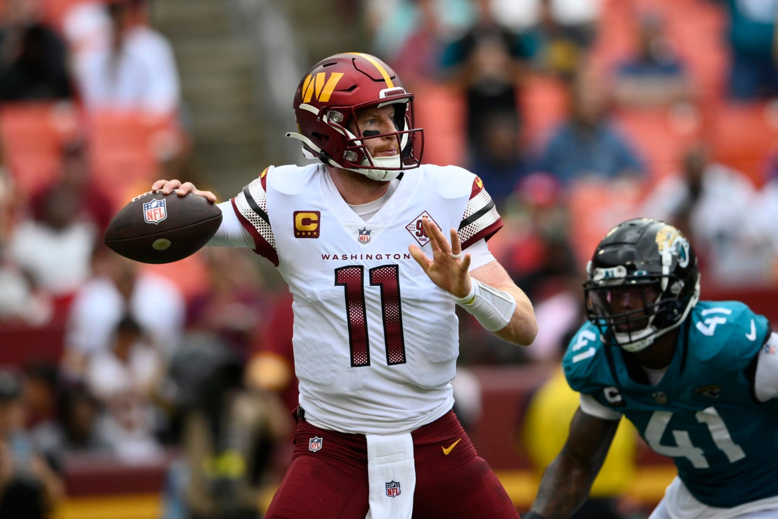 Washington Commanders quarterback Carson Wentz (11) in action during the second half of a NFL football game against the Jacksonville Jaguars, Sunday, Sept. 11, 2022, in Landover, Md. (AP Photo/Nick Wass) Washington Commanders quarterback Carson Wentz (11) in action during the second half of a NFL football game against the Jacksonville Jaguars, Sunday, Sept. 11, 2022, in Landover, Md. (AP Photo/Nick Wass)