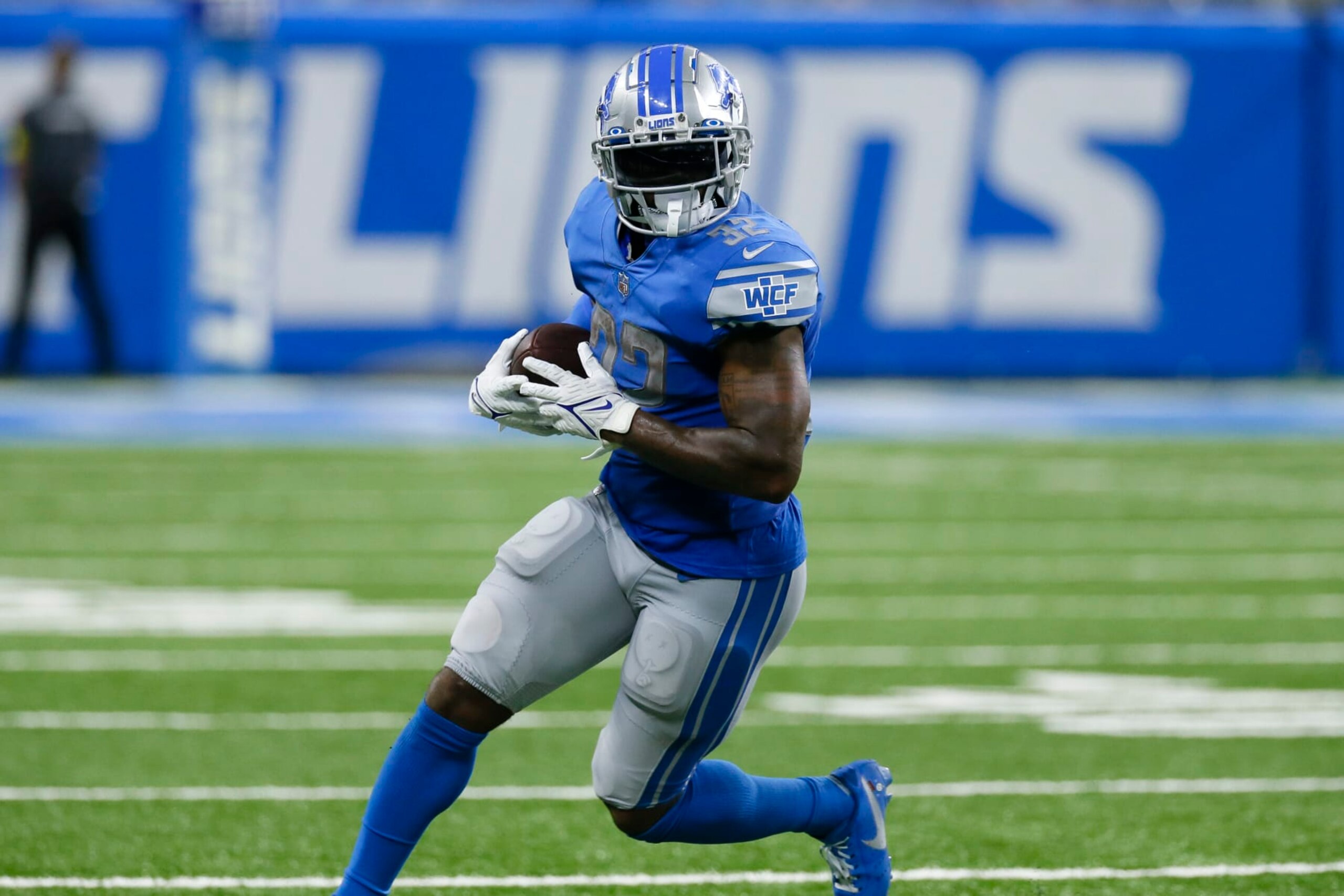 Detroit Lions running back D'Andre Swift (32) runs the ball against the Philadelphia Eagles in the second half of an NFL football game in Detroit, Sunday, Sept. 11, 2022. (AP Photo/Duane Burleson) Detroit Lions running back D'Andre Swift (32) runs the ball against the Philadelphia Eagles in the second half of an NFL football game in Detroit, Sunday, Sept. 11, 2022. (AP Photo/Duane Burleson)