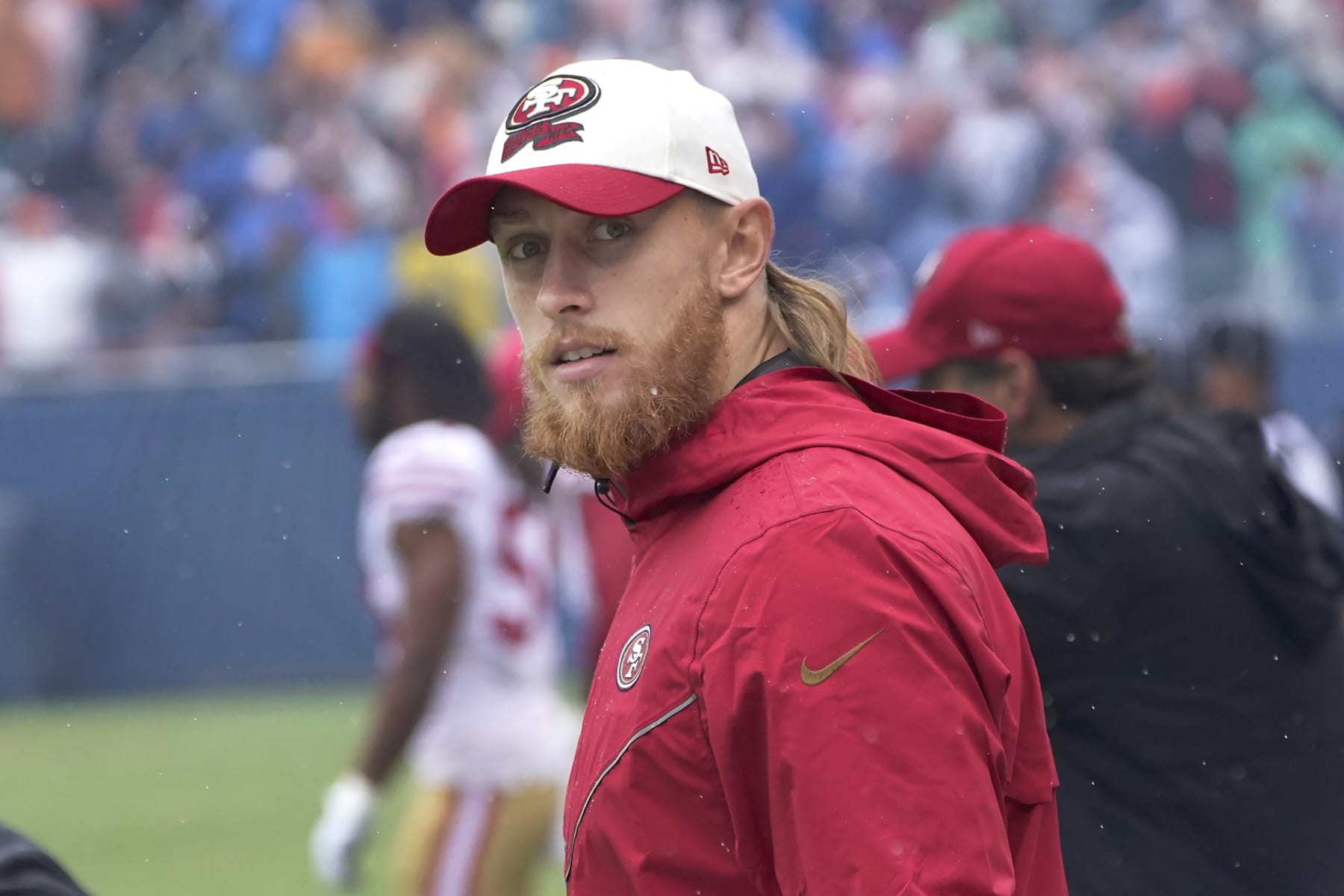 San Francisco 49ers tight end George Kittle stands along the sidelines during an NFL football game against the Chicago Bears Sunday, Sept. 11, 2022, in Chicago. (AP Photo/Charles Rex Arbogast)