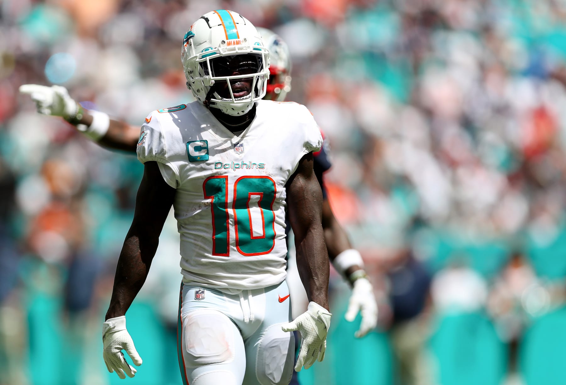 MIAMI GARDENS, FLORIDA - SEPTEMBER 11: Tyreek Hill #10 of the Miami Dolphins looks on during the first half against the New England Patriots at Hard Rock Stadium on September 11, 2022 in Miami Gardens, Florida. (Photo by Megan Briggs/Getty Images)