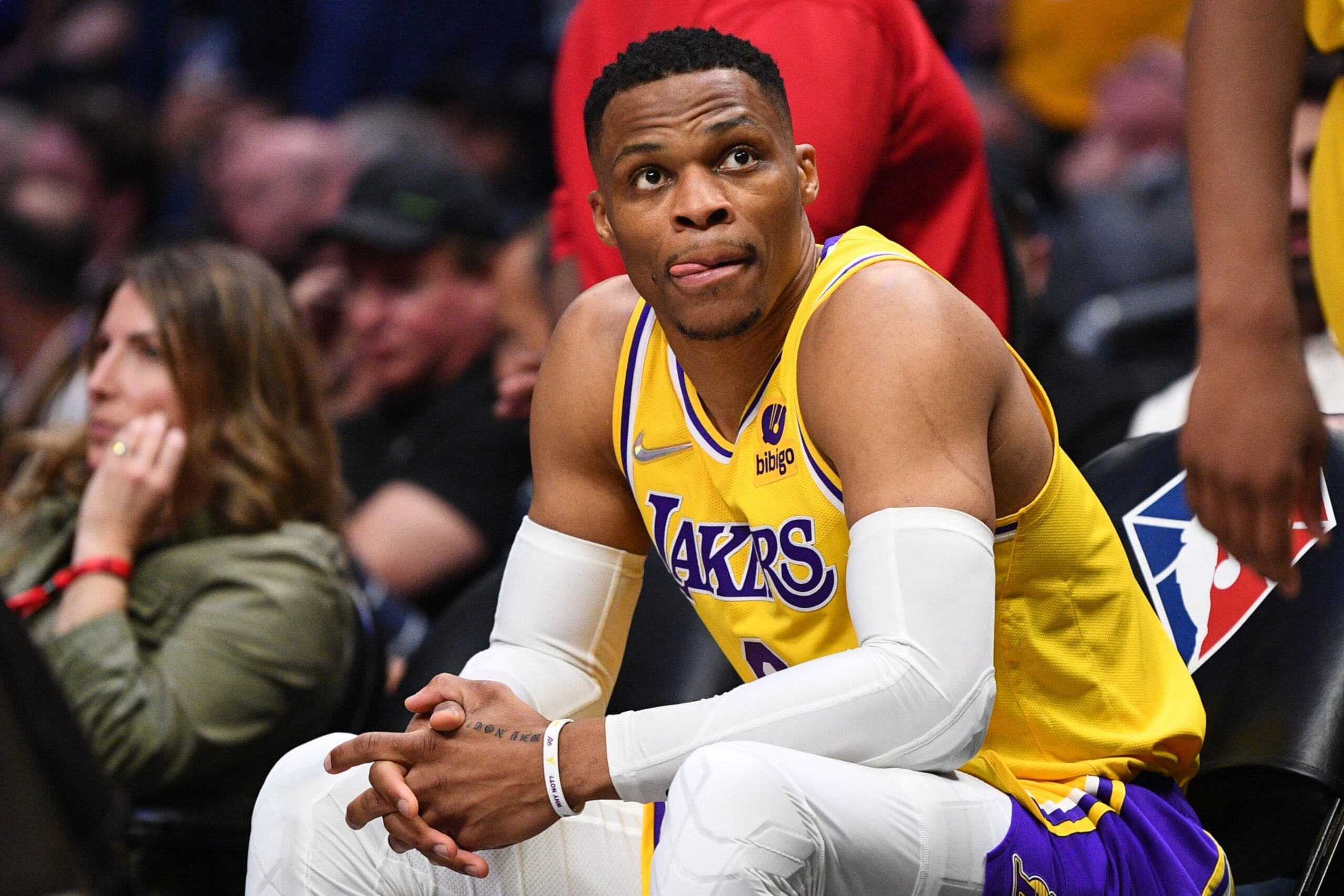 LOS ANGELES, CA - MARCH 03: Los Angeles Lakers Guard Russell Westbrook (0) looks on from the bench during a NBA game between the Los Angeles Lakers and the Los Angeles Clippers on March 3, 2022 at Crypto.com Arena in Los Angeles, CA. (Photo by Brian Rothmuller/Icon Sportswire via Getty Images)