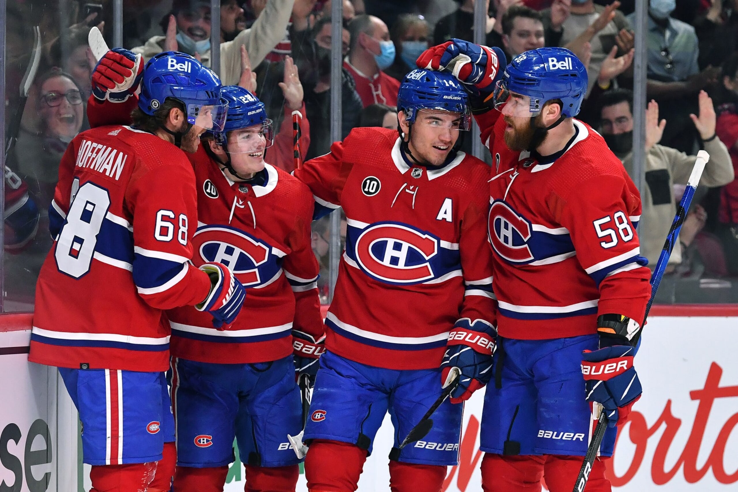 MONTREAL, QC - APRIL 29: Mike Hoffman #68 of the Montreal Canadiens celebrates with teammates after scoring a goal against the Florida Panthers in the NHL game at the Bell Centre on April 29, 2022 in Montreal, Quebec, Canada. (Photo by Francois Lacasse/NHLI via Getty Images) *** Local Caption ***