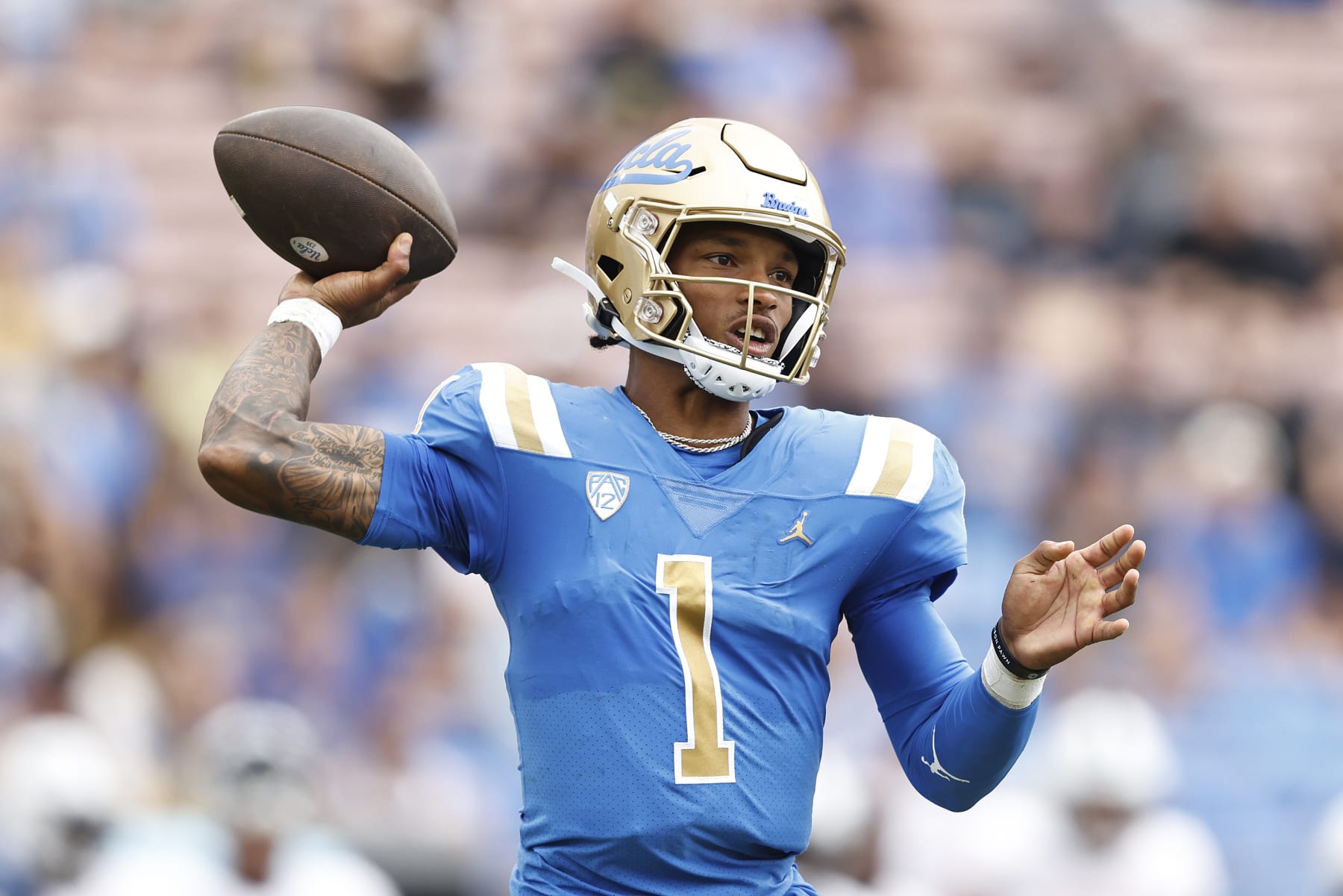 PASADENA, CALIFORNIA - SEPTEMBER 17: Dorian Thompson-Robinson #1 of the UCLA Bruins passes the ball against the South Alabama Jaguars during the first half at Rose Bowl on September 17, 2022 in Pasadena, California. (Photo by Michael Owens/Getty Images)