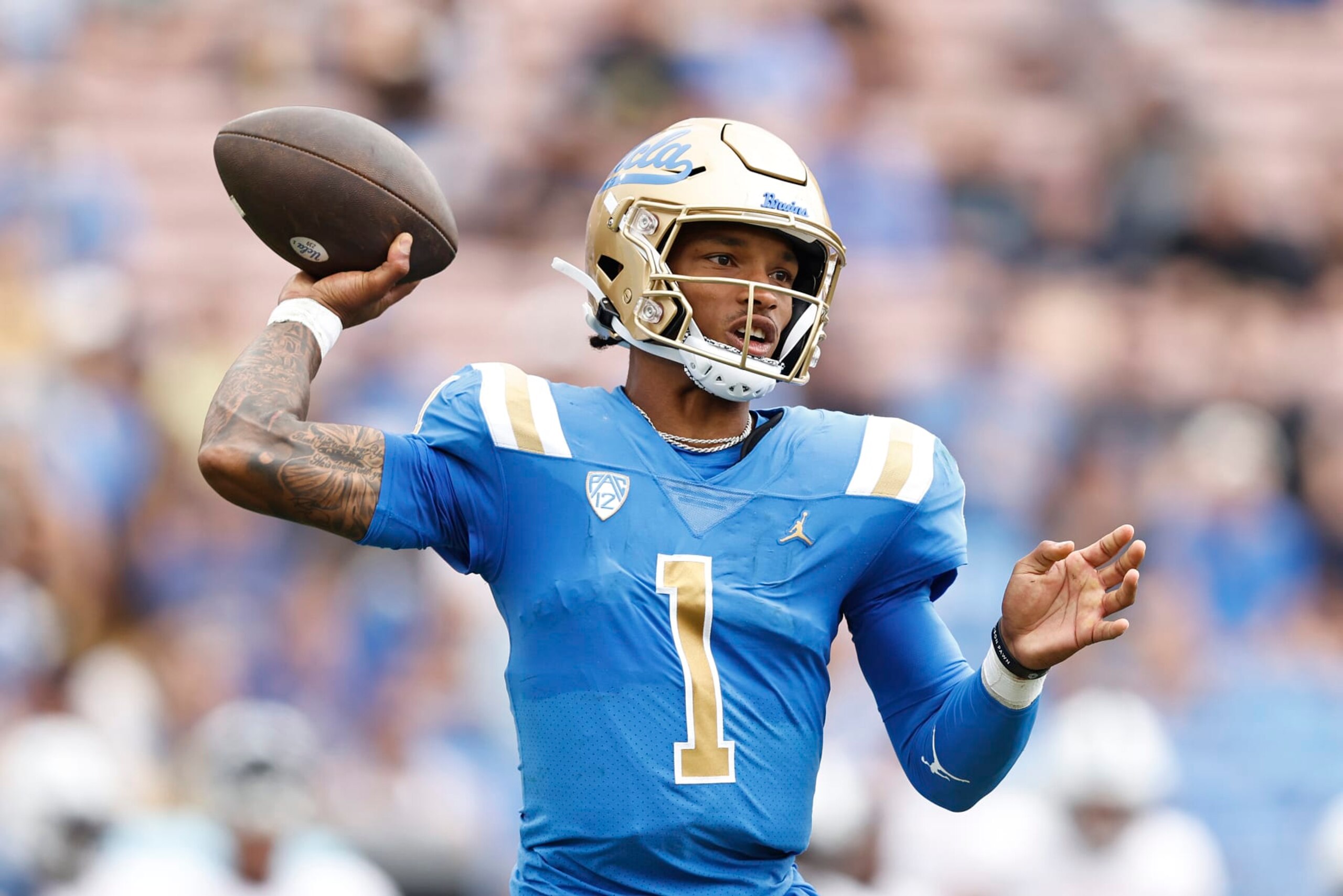 PASADENA, CALIFORNIA - SEPTEMBER 17: Dorian Thompson-Robinson #1 of the UCLA Bruins passes the ball against the South Alabama Jaguars during the first half at Rose Bowl on September 17, 2022 in Pasadena, California. (Photo by Michael Owens/Getty Images)