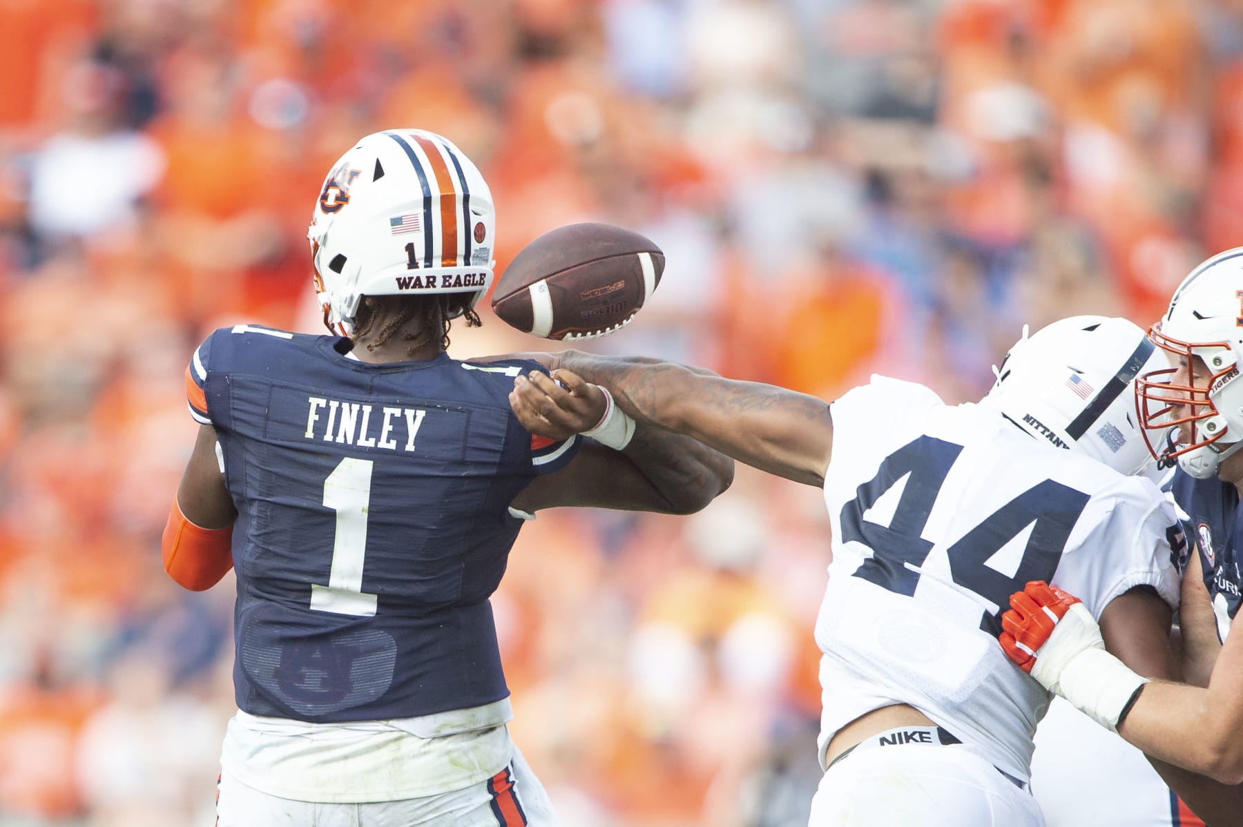 AUBURN, ALABAMA - SEPTEMBER 17: Defensive end Chop Robinson #44 of the Penn State Nittany Lions causes a fumble after hitting the arm of quarterback T.J. Finley #1 of the Auburn Tigers at Jordan-Hare Stadium on September 17, 2022 in Auburn, Alabama. (Photo by Michael Chang/Getty Images)
